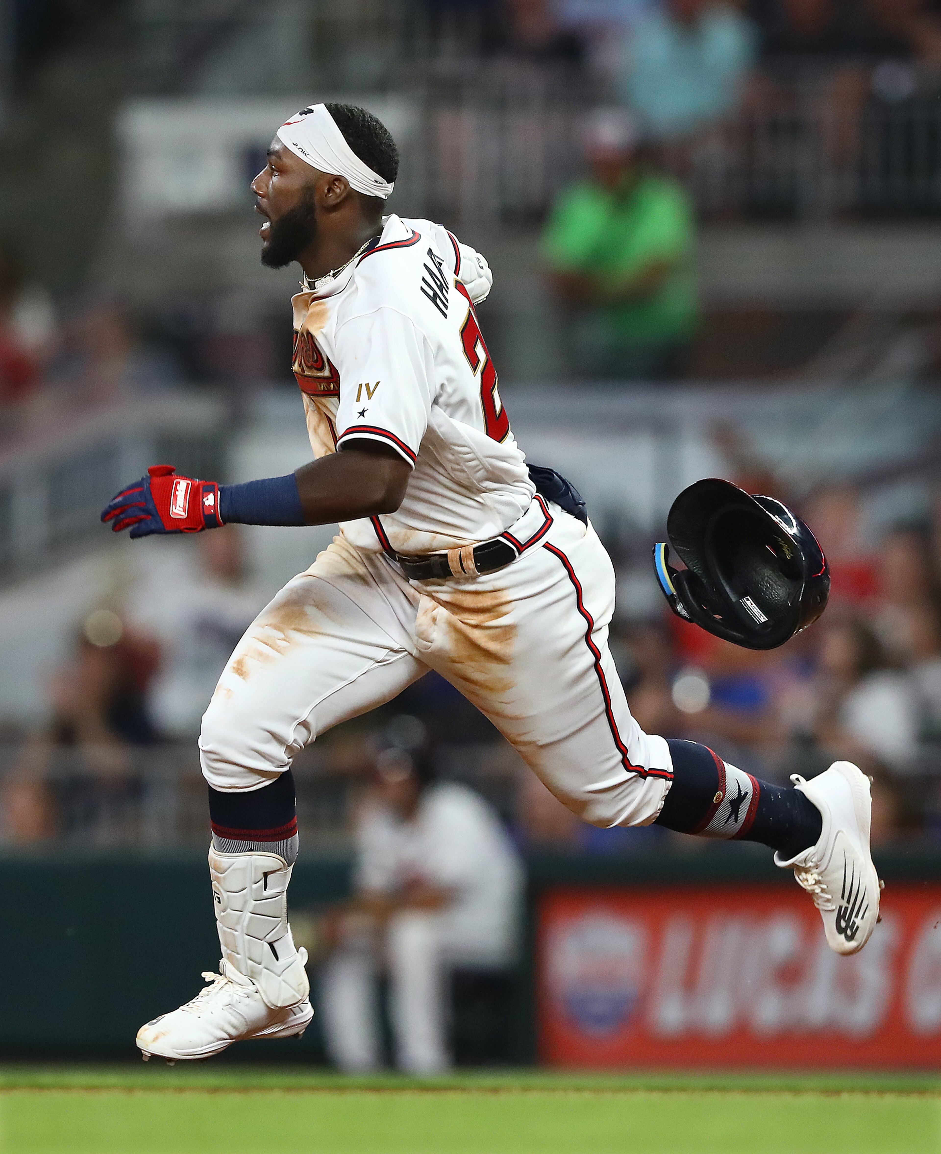 Atlanta Braves outfielder Michael Harris loses his helmet on the way to second base for a double against the Oakland Athletics during the seventh inning during an MLB game on Wednesday, June 8, 2022, in Atlanta. The Braves beat the Athletics 13-2. (Curtis Compton / Curtis.Compton@ajc.com)