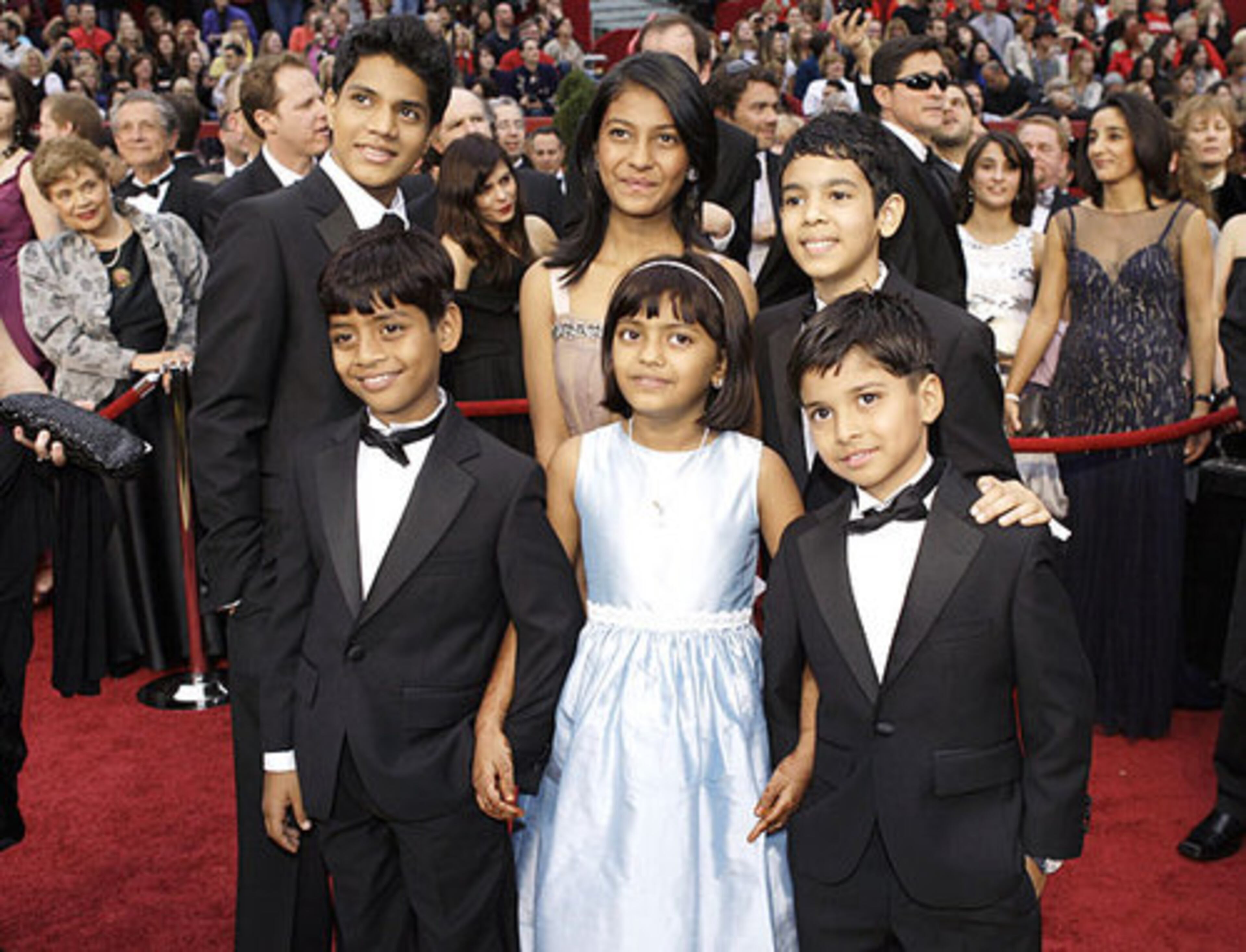 The young stars at the Academy Awards in February. From left front are Azharuddin Mohammed Ismail (who played Salim), Rubina Ali (Latika), and Ayush Mahesh Khedekar (Jamal). Playing those respective characters as early teens are, from left rear, Ashutosh Lobo Gajiwala, Tanvi Ganesh Lonkar and Tanay Hemant Chheda.