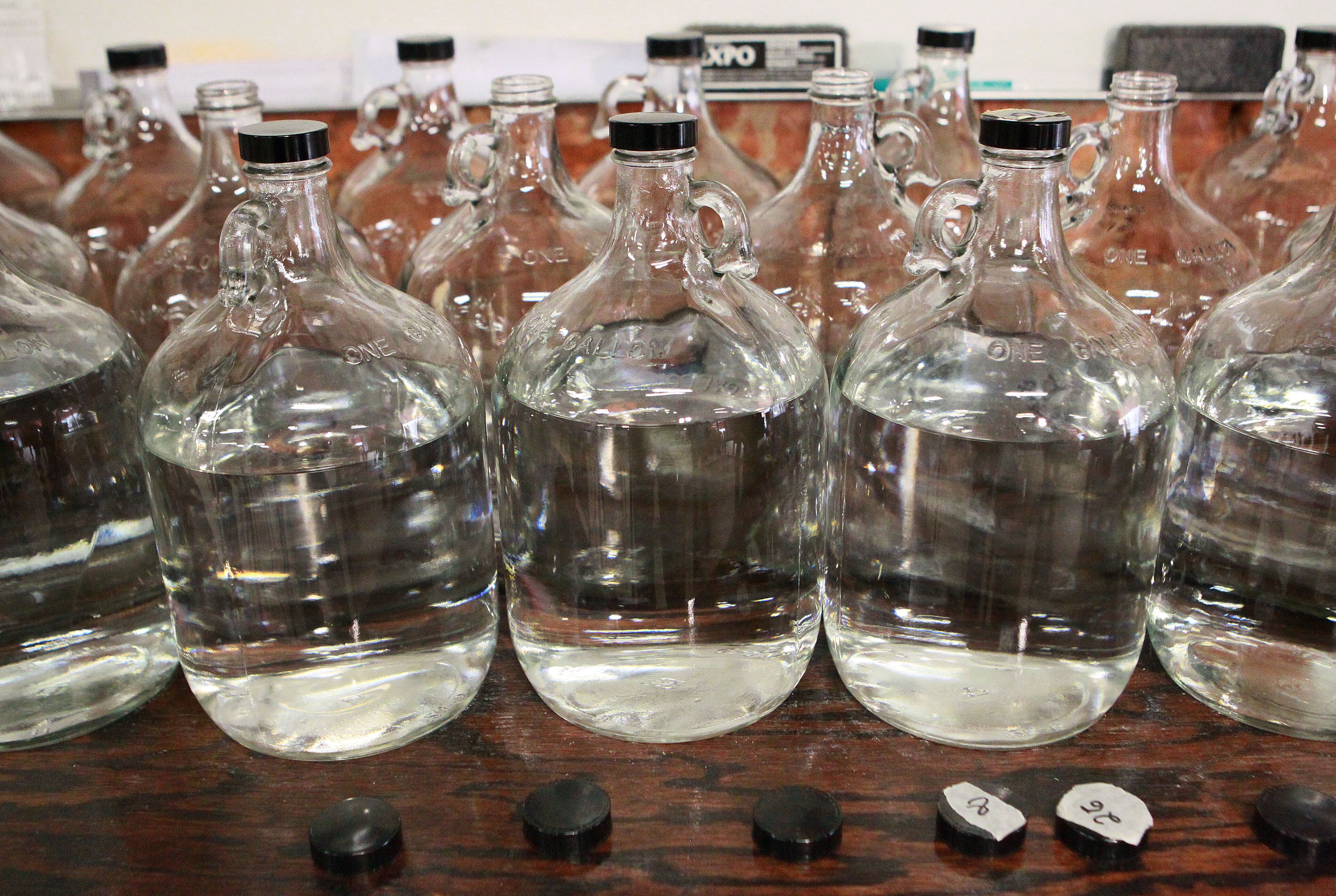 Bottles of distilled rum are numbered by batches at Richland Distilling Company.