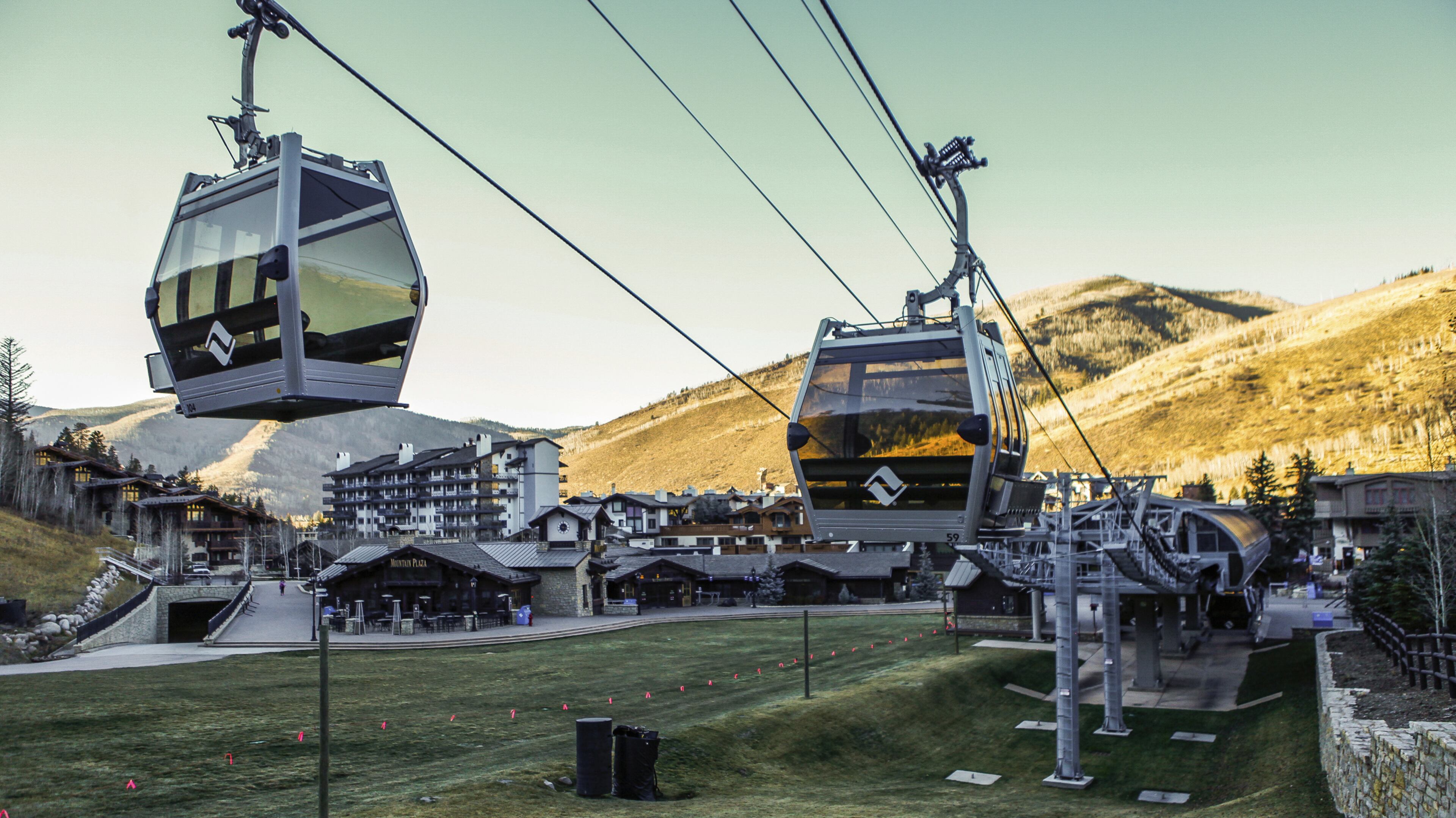 In this Tuesday, Nov. 15, 2016 photo, Vail’s Gondola One runs on, despite no snow in Vail, Colo. The opening, which was scheduled for Friday, has been pushed back until Friday, Nov. 25. (Chris Dillmann /Vail Daily via AP)