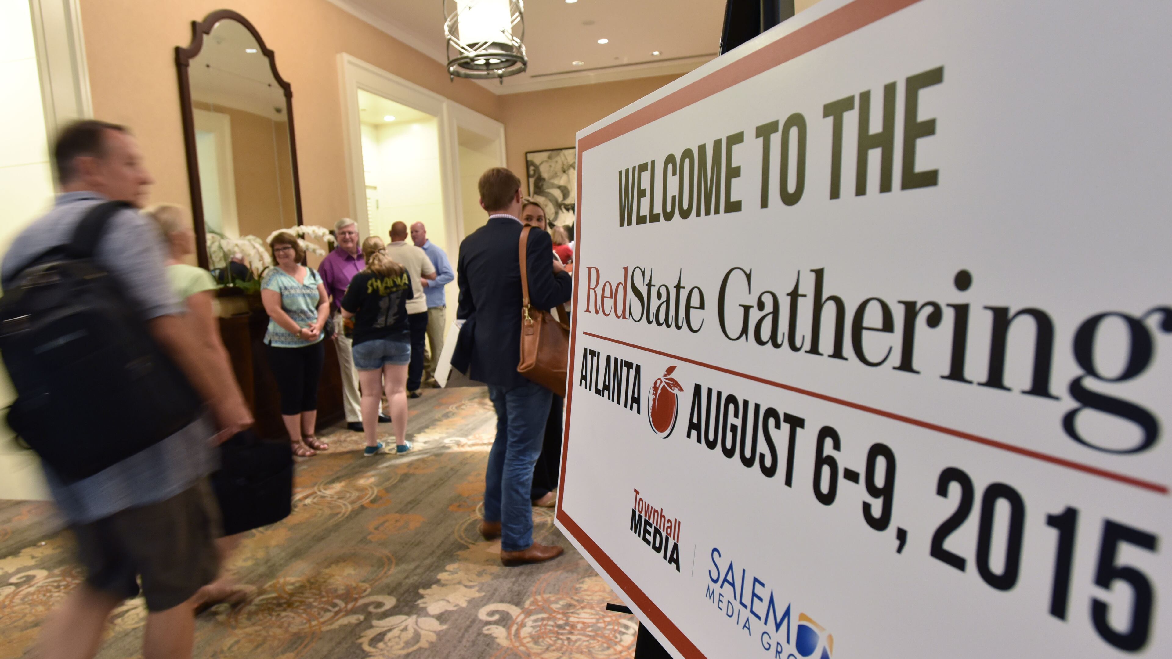 Attendees flow into the RedState Gathering at Intercontinental Buckhead Hotel on Thursday. Hyobsub Shin, hshin@ajc.com