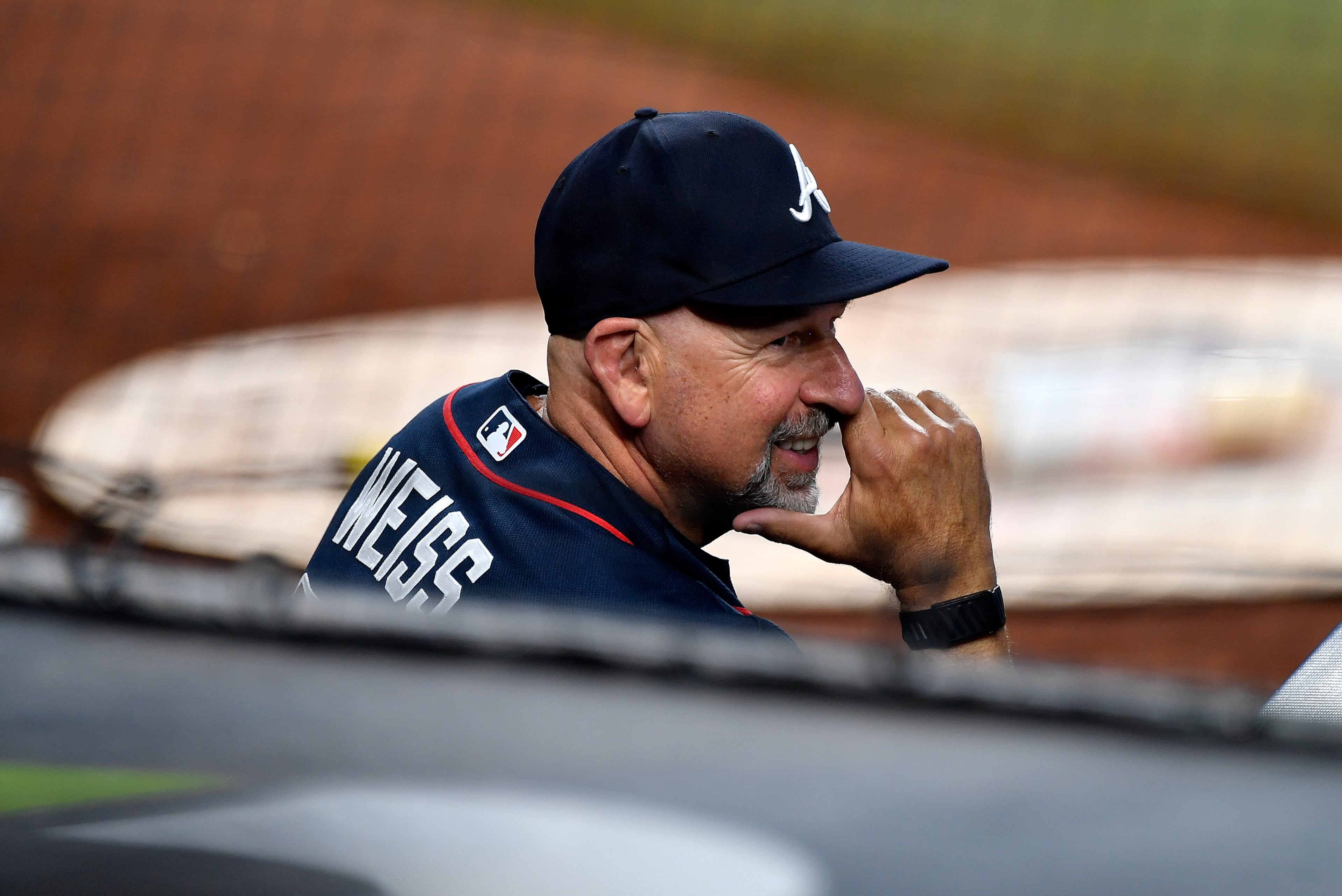 Braves manager Walt Weiss was all grins in Miami. (Michael Laughlin/AP)