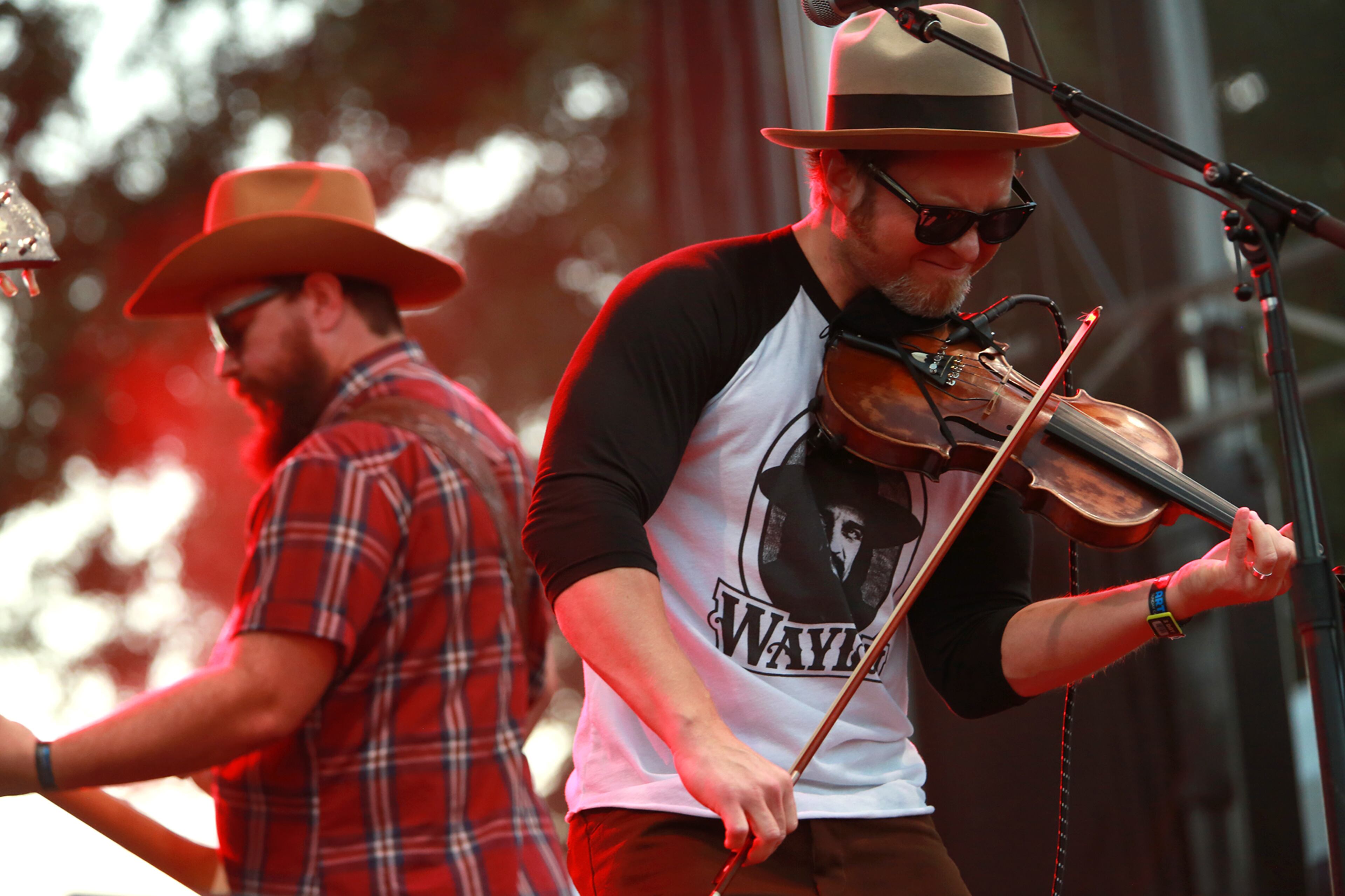 Kyle Nix (right), fiddler, and RC Edwards (left), bassist, of Oklahoma band Turnpike Troubadours, perform at the Austin Ventures Stage during the first weekend of Austin City Limits Music Festival at Zilker Park, on Sunday, October 5, 2014.