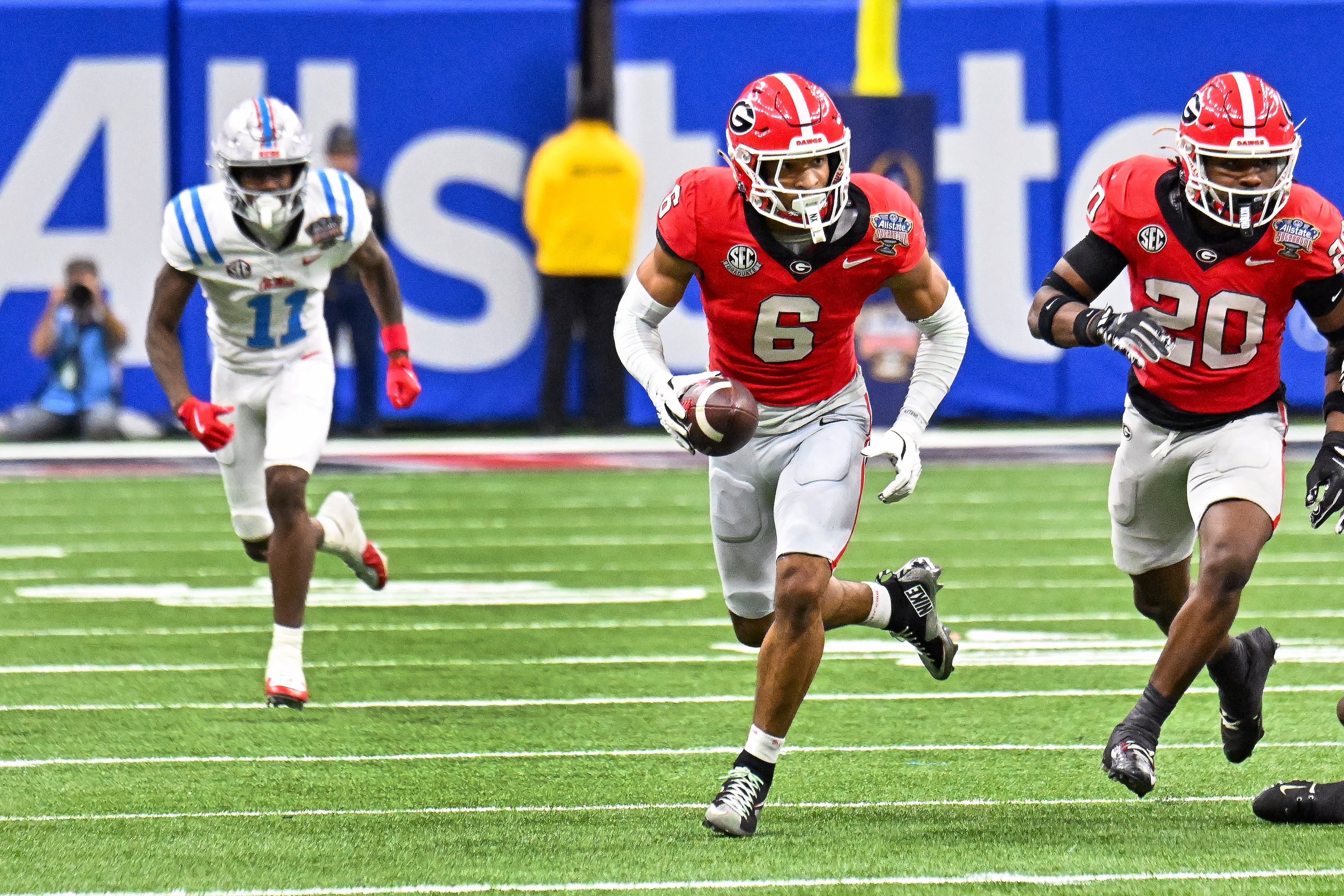 Georgia Bulldogs defensive back Daylen Everette (6) recovers a fumble from Ole Miss Rebels running back Kewan Lacy (5) for a 47-yard touchdown run during the second quarter of the NCAA College Football Playoff quarterfinal game at the Sugar Bowl in the Caesars Superdome, Thursday, Jan. 1, 2026, in New Orleans. (Hyosub/AJC)