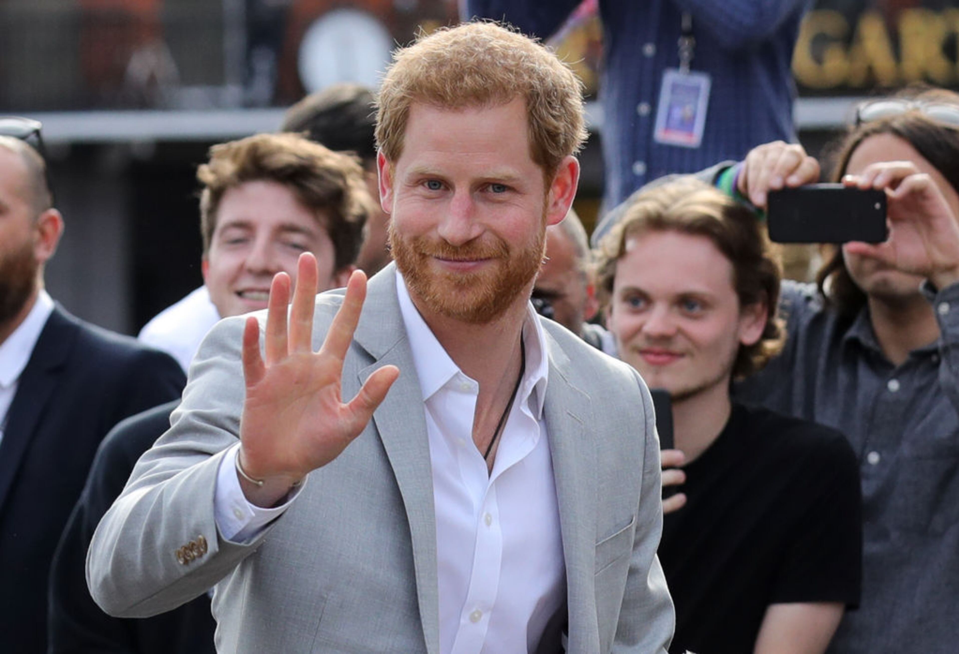 WINDSOR, ENGLAND - MAY 18: Prince Harry greets members of the public as he embarks on a walkabout ahead of the royal wedding of Prince Harry and Meghan Markle on May 18, 2018 in Windsor, England. (Photo by Chris Furlong/Getty Images)