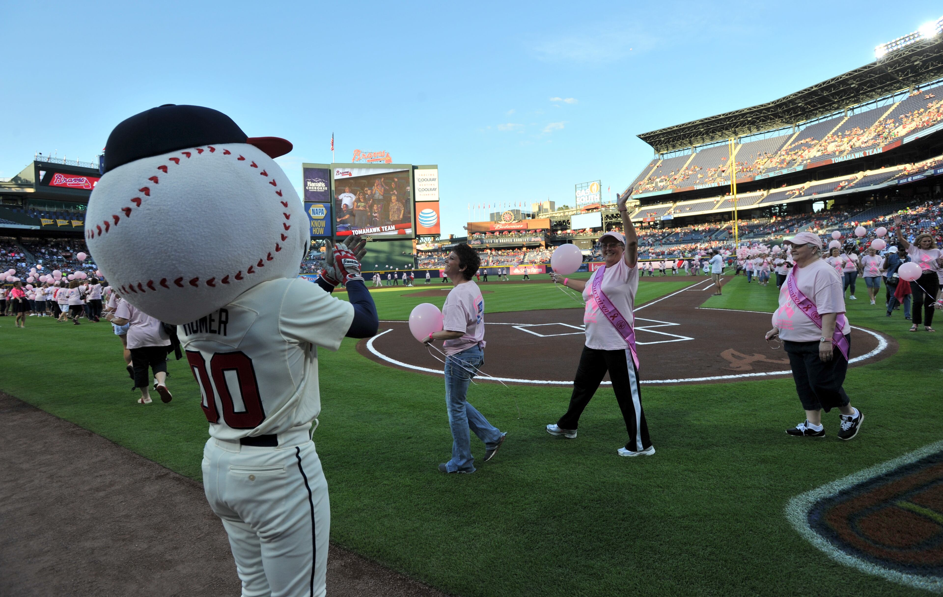 Atlanta Braves Homer cheer for survivors during "A Walk in the Park" a Pre-Game On-Field Ceremony before Atlanta Braves game against the San Diego Padres at Turner Field in Atlanta on Saturday, September 14, 2013. This season, the Atlanta Braves, WellStar Health System, Kroger and the American Cancer Society's Making Strides Against Breast Cancer team up for the 7th Annual Braves Breast Cancer Awareness Day on Saturday, September 14, 2013 at 7:10 pm. The day-long celebration of survivorship honors those who have courageously battled breast cancer, and raised awareness and funds to support research, education and advocacy for cancer patients and their families throughout metro Atlanta.
