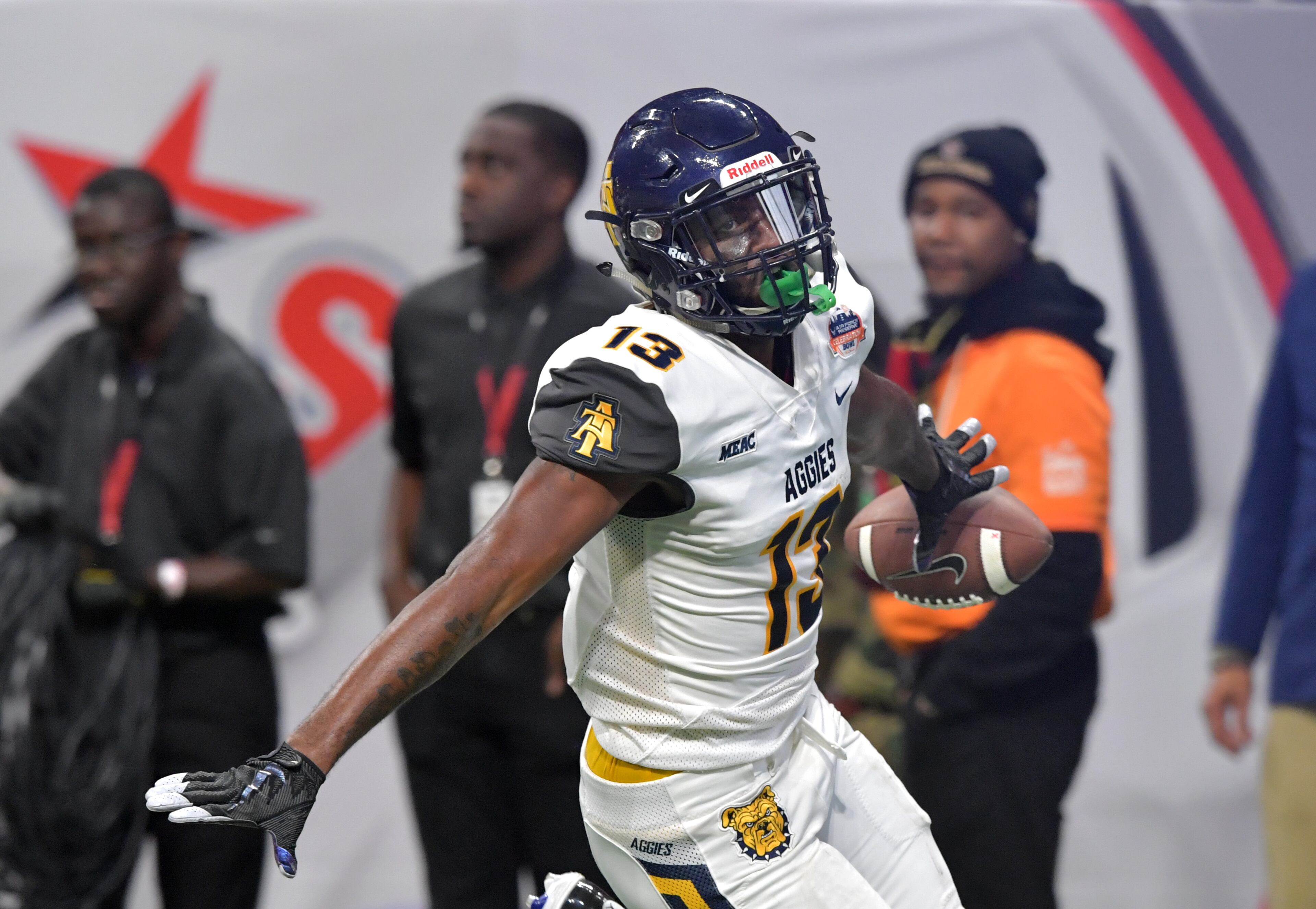 December 15, 2018 Atlanta - North Carolina A&T wide receiver Elijah Bell (13) celebrates as he scores a touchdown during the first half of the 2018 Celebration Bowl at Mercedes-Benz Stadium on Saturday, December 15, 2018. HYOSUB SHIN / HSHIN@AJC.COM