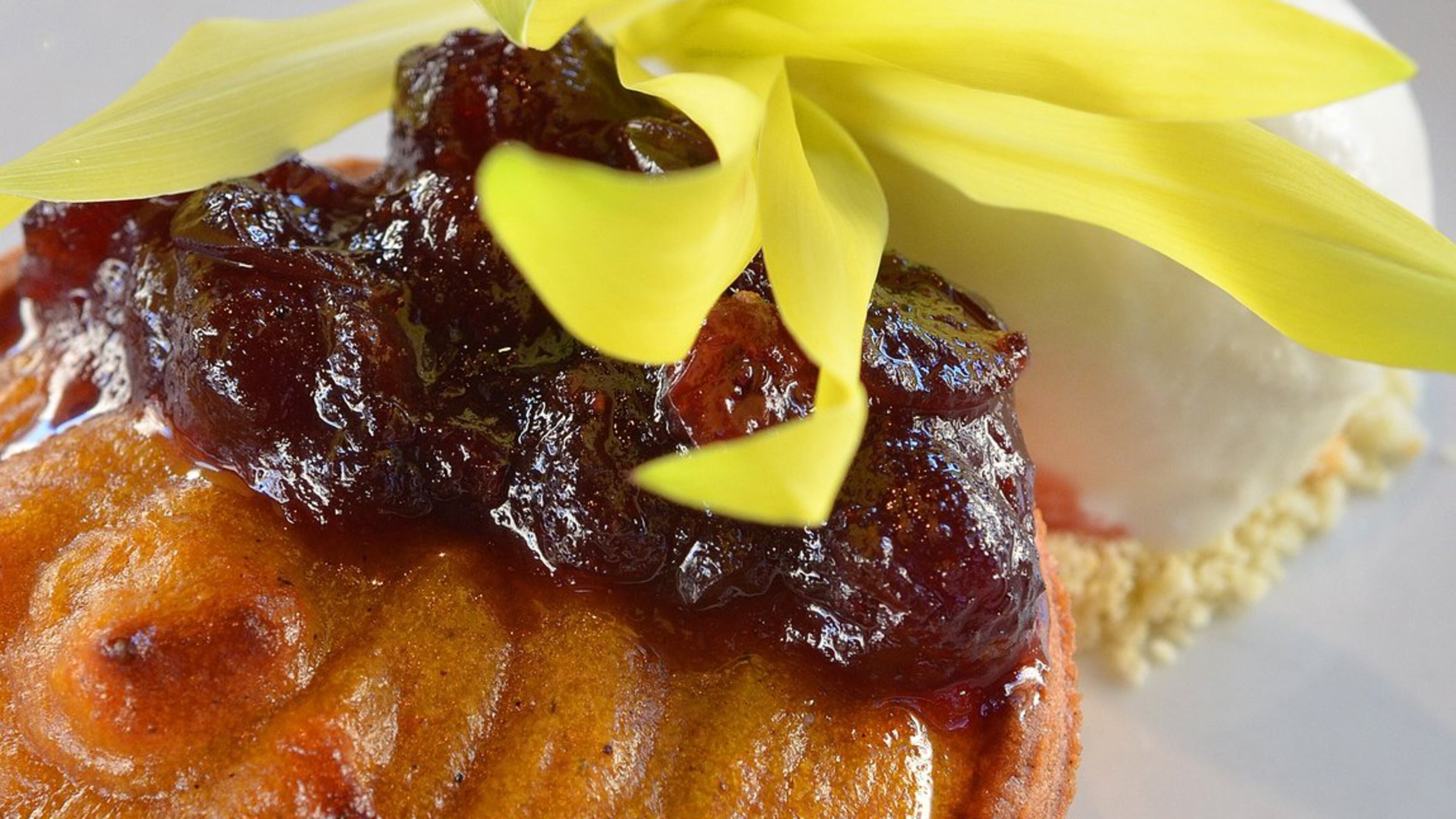 The warm butternut squash tart is served with Dark & Stormy ice cream, cranberry compote, sugar cookie crumbles and a corn sprout garnish at the Shed at Glenwood. (Chris Hunt / Special)