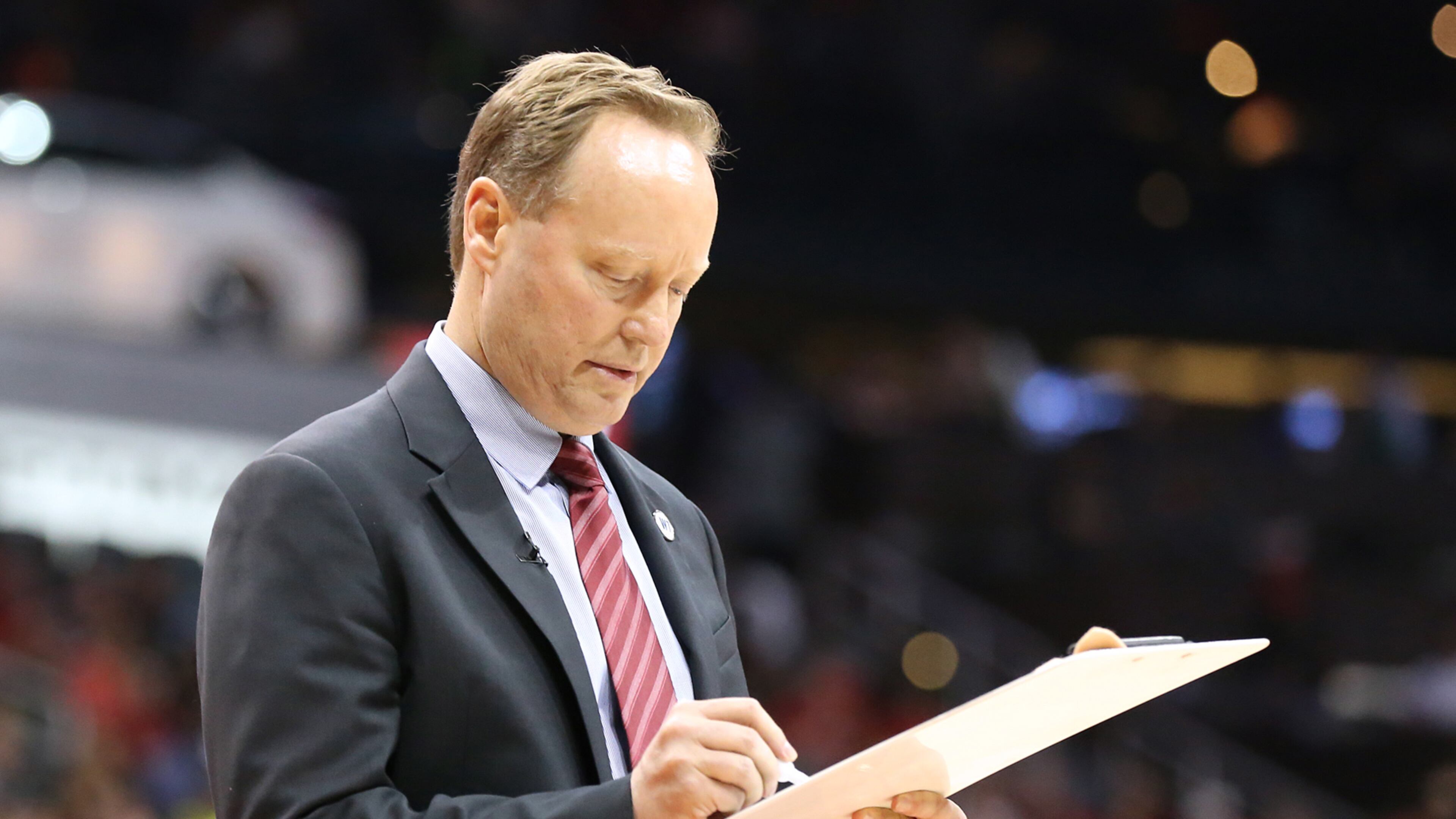 041916 ATLANTA: Hawks head coach Mike Budenholzer draws up a play during a time out against the Celtics in their NBA Eastern Conference first round playoff game at Philips Arena on Tuesday, April 19, 2016. Curtis Compton / ccompton@ajc.com