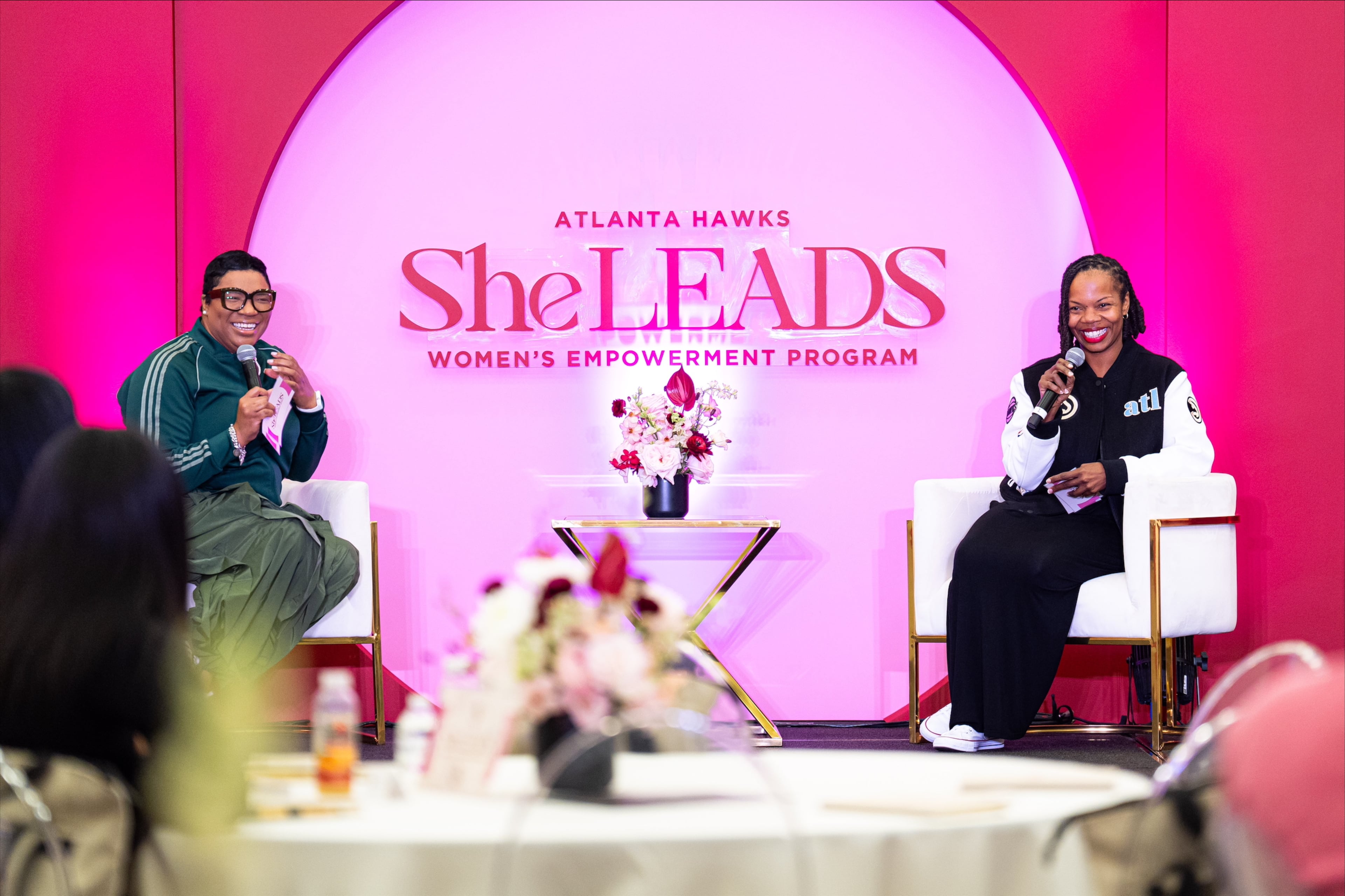 Jai Ferrell (left), CEO of the Girl Scouts of Greater Atlanta, and Melissa Proctor, chief marketing officer of the Atlanta Hawks, speak at the Atlanta Hawks She LEADS Women's Empowerment Summit on Thursday, Feb. 19, 2026. (Steven Burroughs/Courtesy of the Atlanta Hawks)