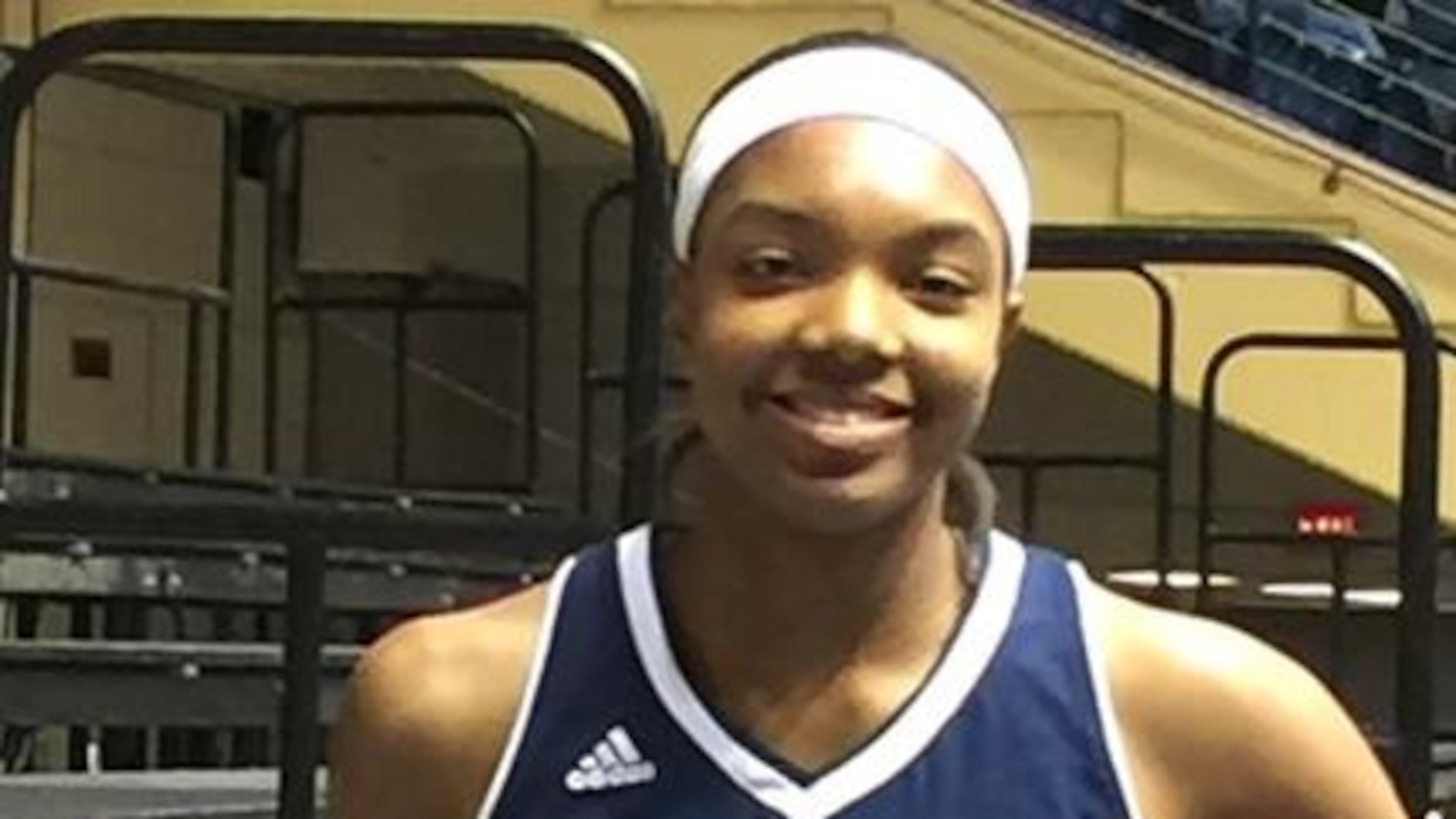 Maya Dodson holds the second of two state-championship trophies she's won at St. Francis.