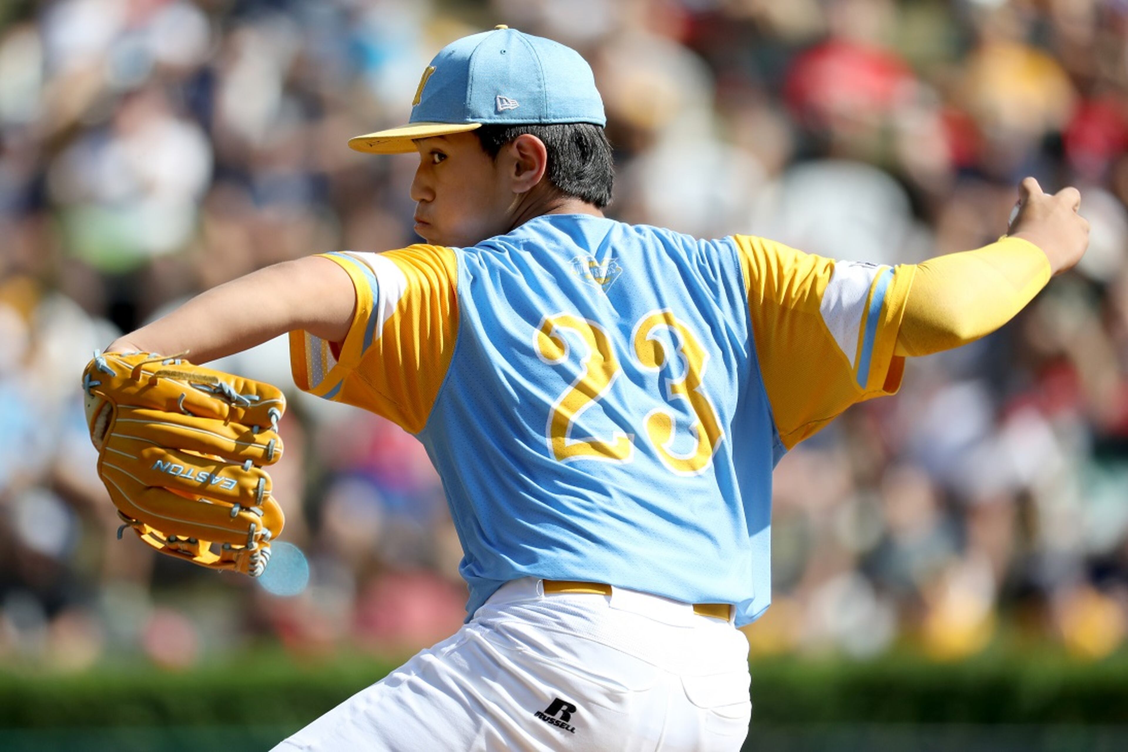 SOUTH WILLIAMSPORT, PA - AUGUST 25: Starting pitcher Aukai Kea #23 of the West Region from Hawaii throws to a batter from the Southeast Team of Georgia during the U.S. Championship game of the Little League World Series at Lamade Stadium on August 25, 2018 in South Williamsport, Pennsylvania. (Photo by Rob Carr/Getty Images)