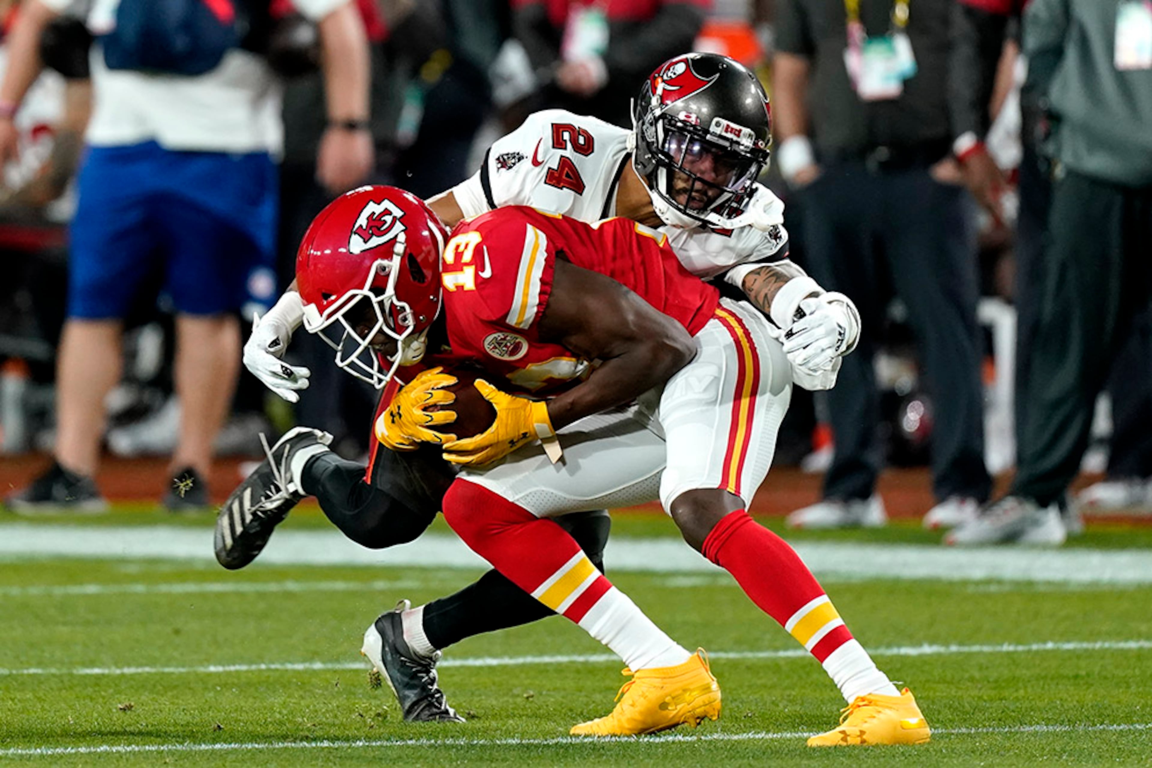 Kansas City Chiefs wide receiver Byron Pringle is tackled by Tampa Bay Buccaneers cornerback Carlton Davis during the first half of Super Bowl 55 football game Sunday, Feb. 7, 2021, in Tampa, Fla. (Mark Humphrey/AP)