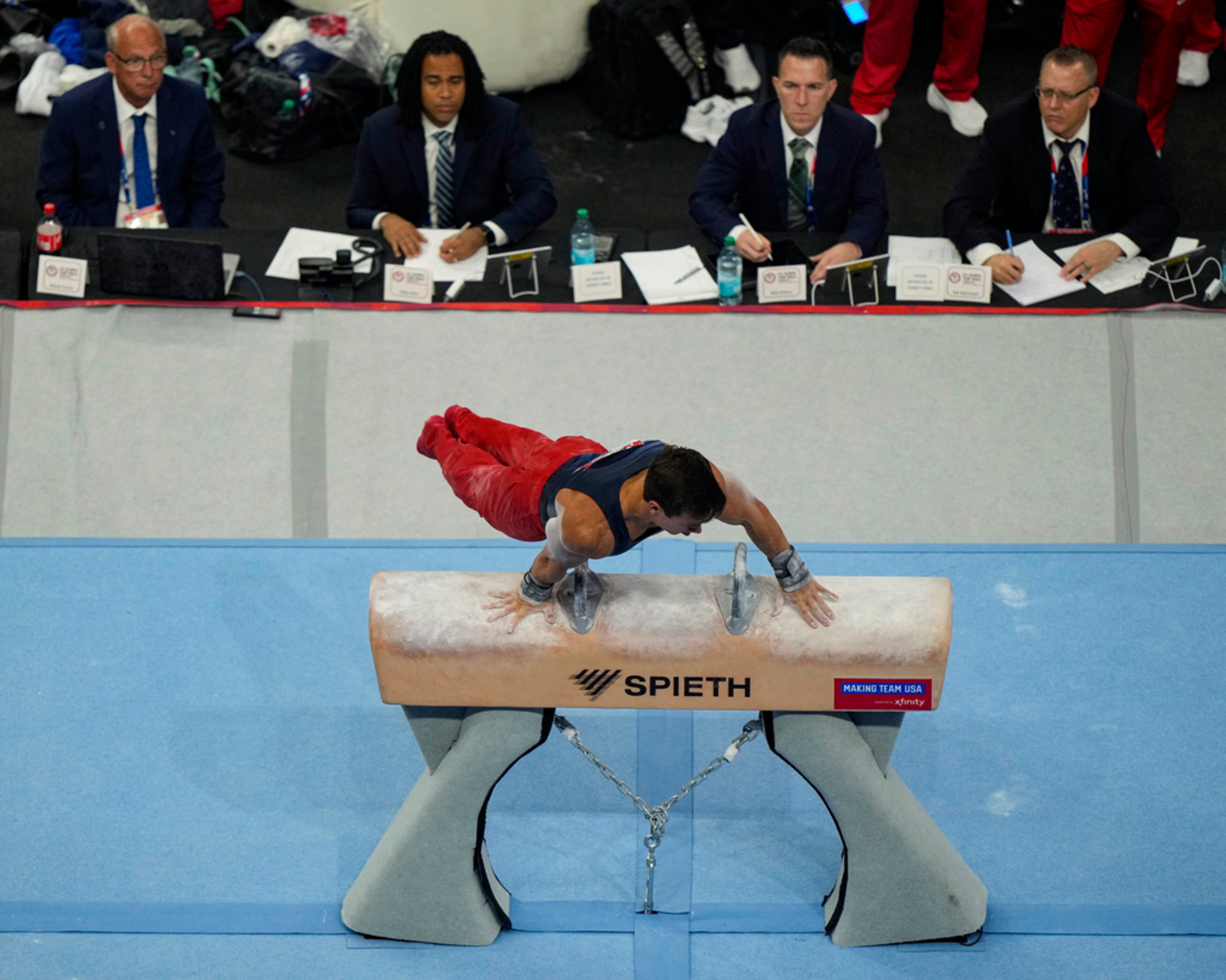 Brody Malone competes on the pommel horse at the United States Gymnastics Olympic Trials on Thursday, June 27, 2024, in Minneapolis. (AP Photo/Charlie Riedel)