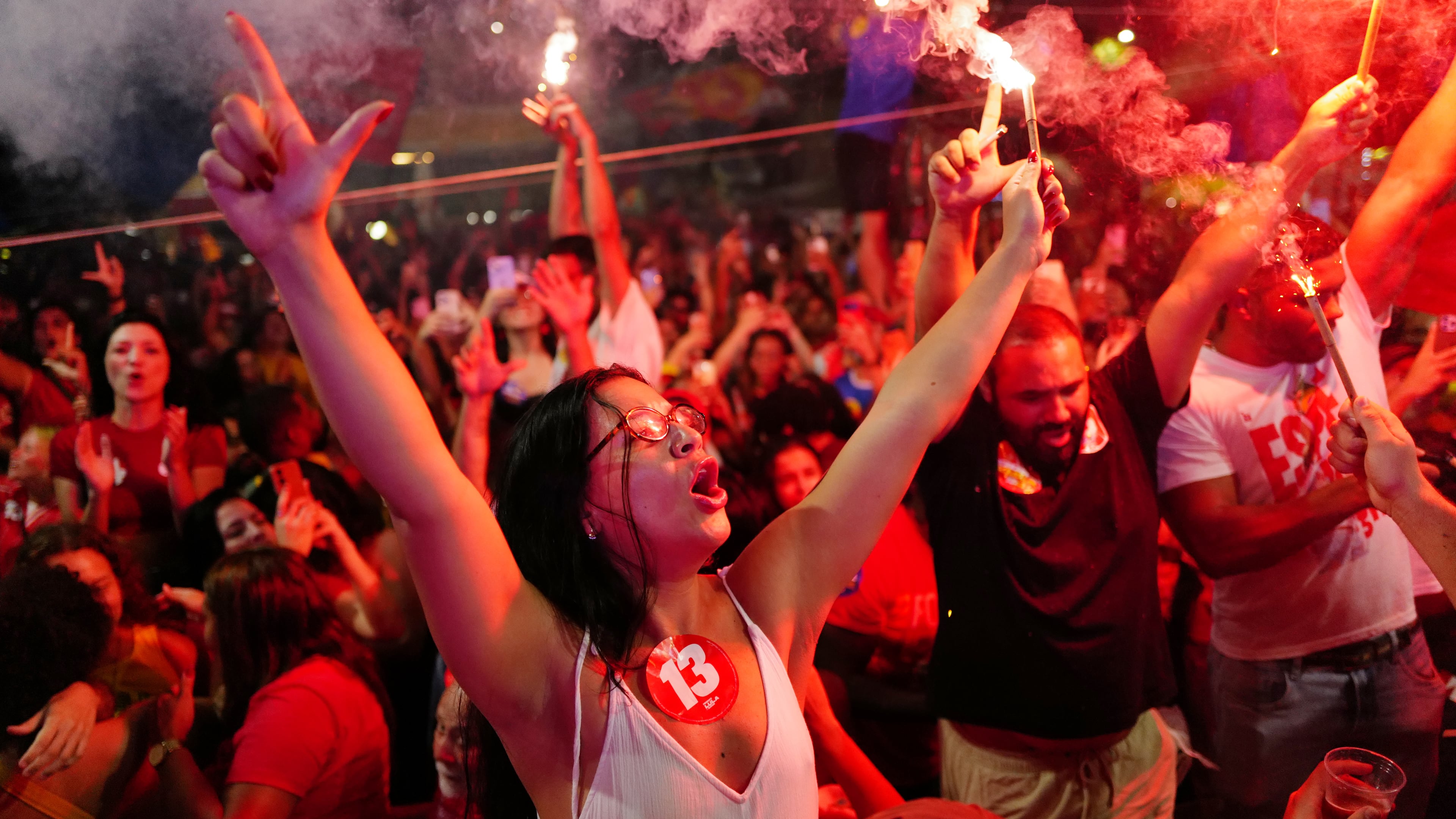 Supporters of President Luiz Inacio Lula da Silva celebrate after he won the presidential runoff in Rio de Janeiro, Sunday, Oct. 25, 2026. (AP Photo/Lucas Landau)