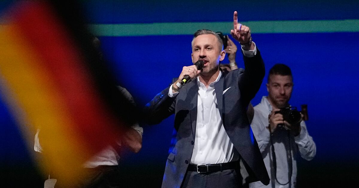 German chancellor faces tough times after first far-right party's state election win since Nazi era