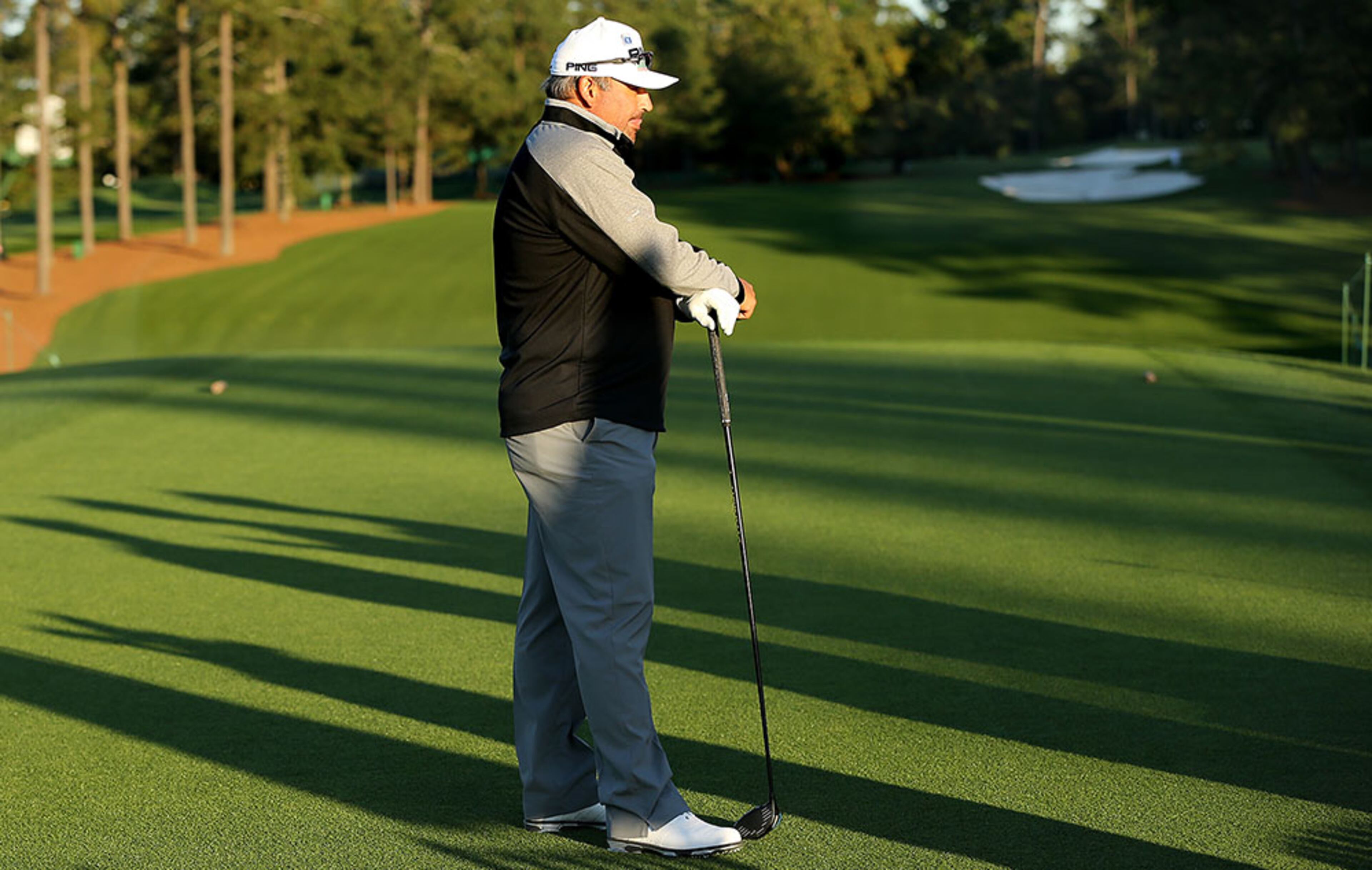 Angel Cabrera, the 2009 Masters champion, is the first golfer out waiting to tee off on the first hole for his practice round at Augusta National Golf Club on Tuesday, April 5, 2016, in Augusta.