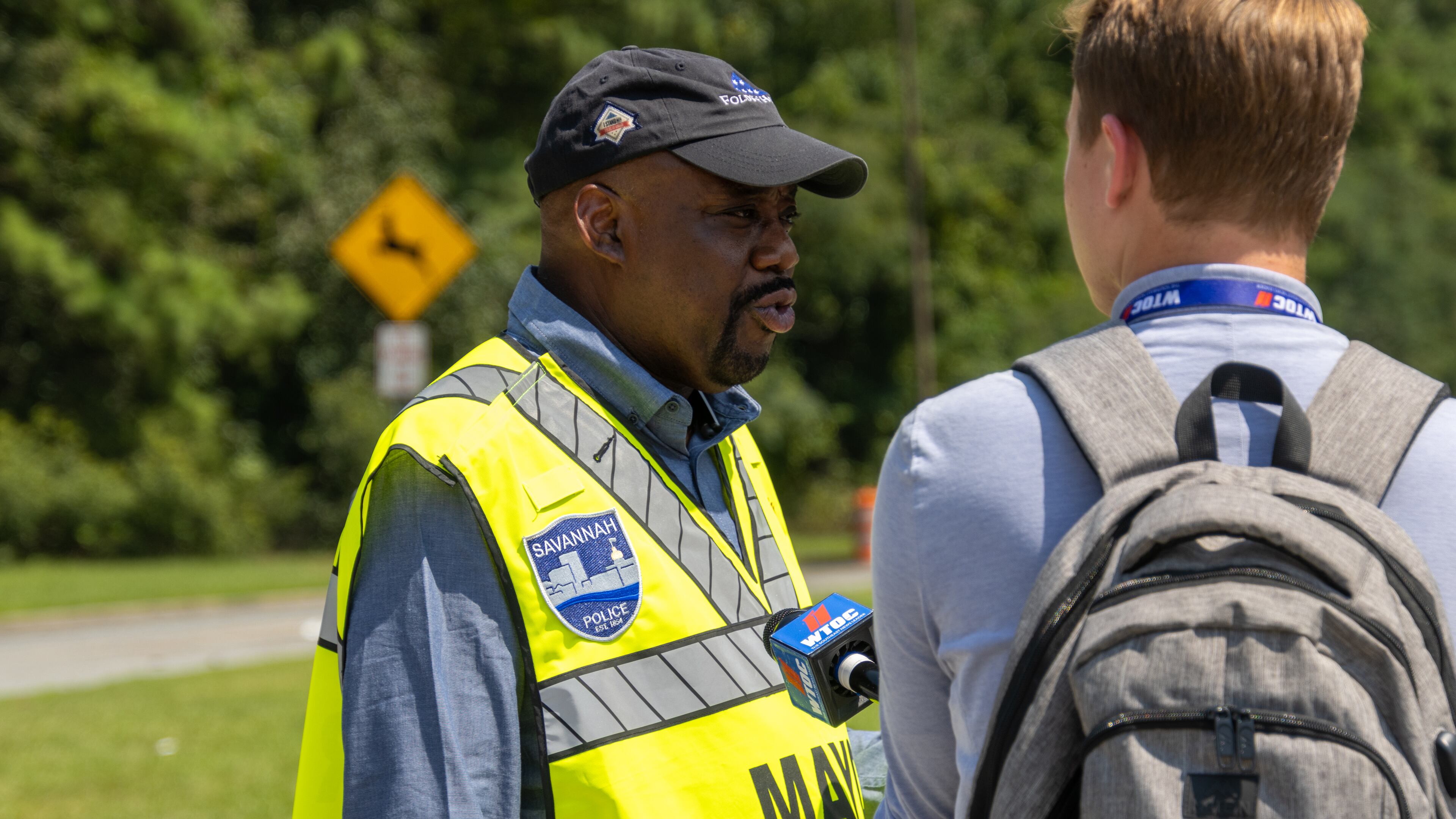Savannah Mayor Van Johnson spoke to a reporter after flooding in the area last year. (AJC file photo)