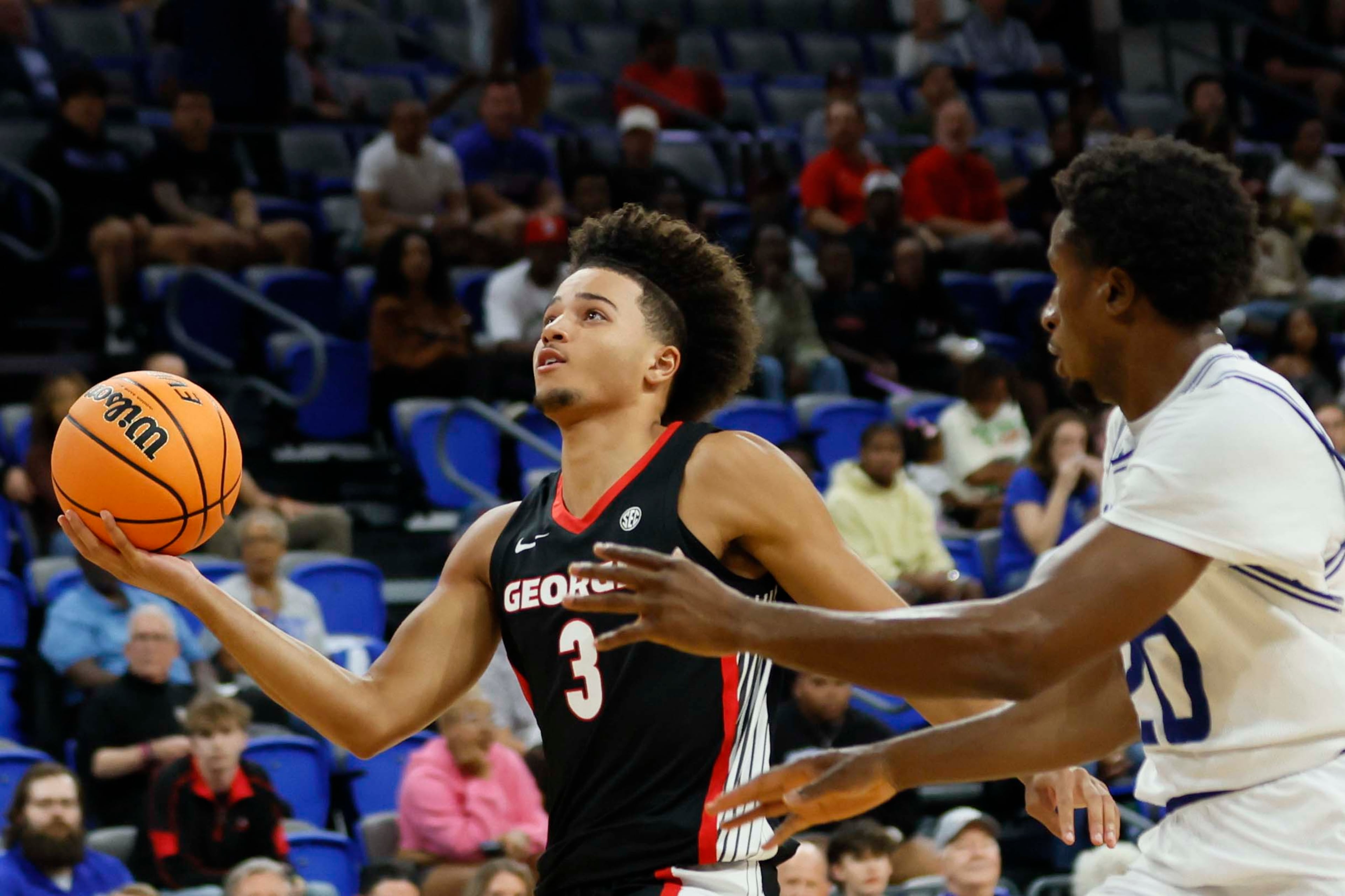 Georgia Bulldogs guard Jordan Ross (3) attempts a basket against Georgia State Panthers guard Ayouba Berthe (20) during the first half of an exhibition opener game at the Georgia State Convocation Center, Wednesday, October 15, 2025, in Atlanta.
(Miguel Martinez/ AJC)