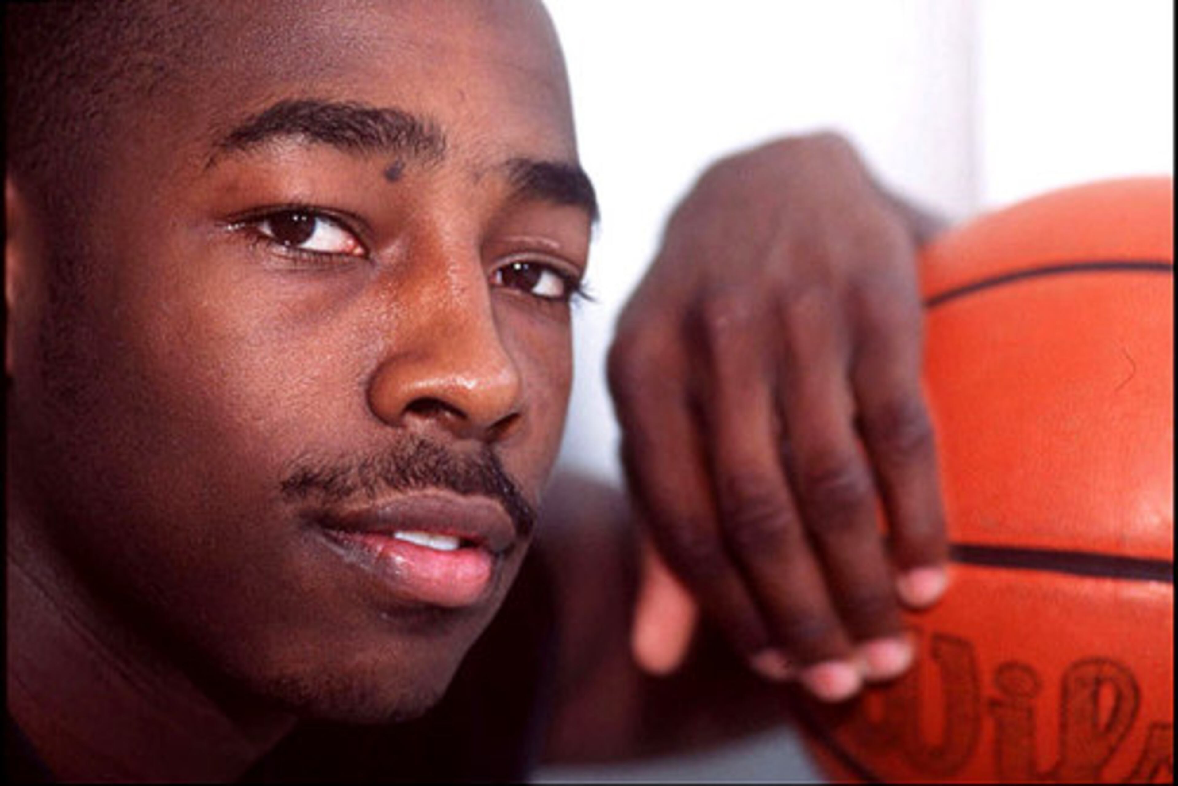 2. Hoop Dreams (1994) -- The best of three documentaries on this list, Hoop Dreams follows Arthur Agee (shown above) and William Gates, talented high school basketball players living in the Cabrini Green housing project in Chicago. You watch them through all four years of school, trying to earn a college scholarship. Great stuff.