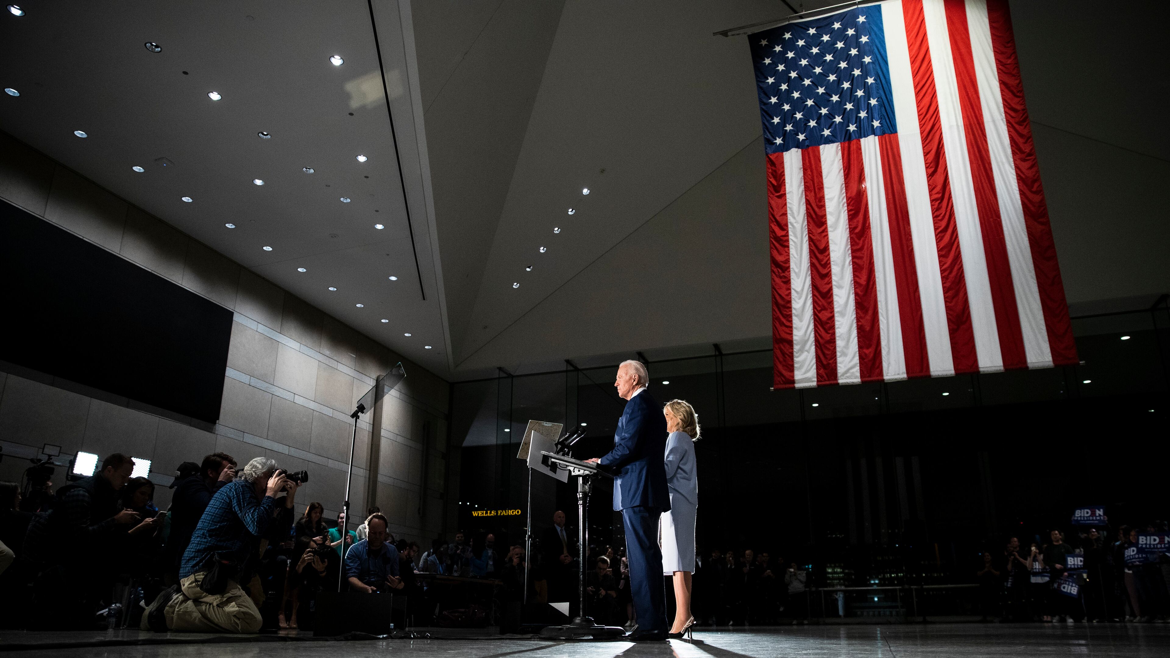 Democratic presidential candidate former Vice President Joe Biden, accompanied by his wife Jill, speaks to members of the press at the National Constitution Center in Philadelphia, Tuesday, March 10, 2020. (AP Photo/Matt Rourke)