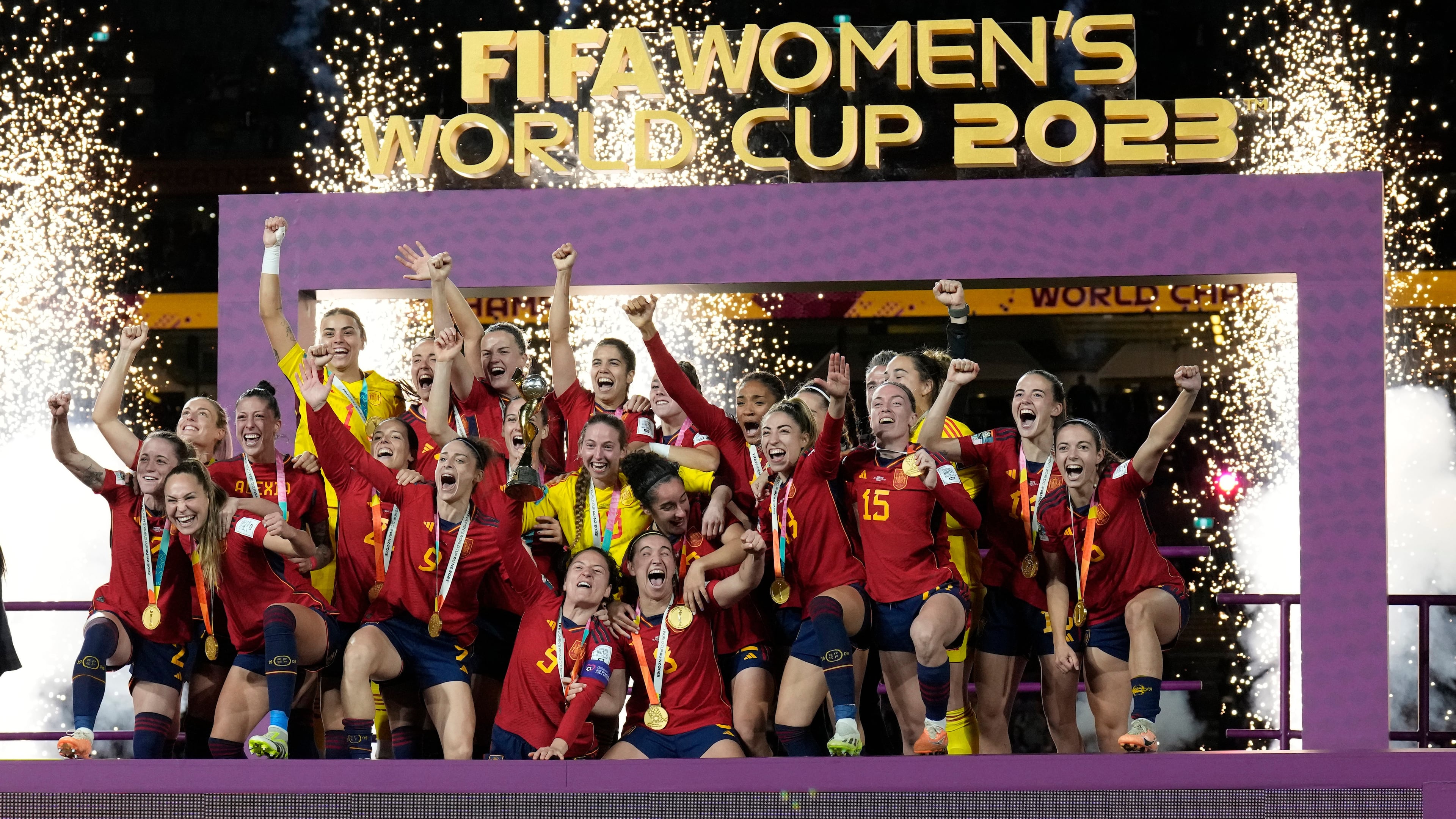 FILE - Team Spain celebrates with the trophy after winning the Women's World Cup soccer final against England at Stadium Australia in Sydney, Australia, August 20, 2023. (AP Photo/Alessandra Tarantino, File)