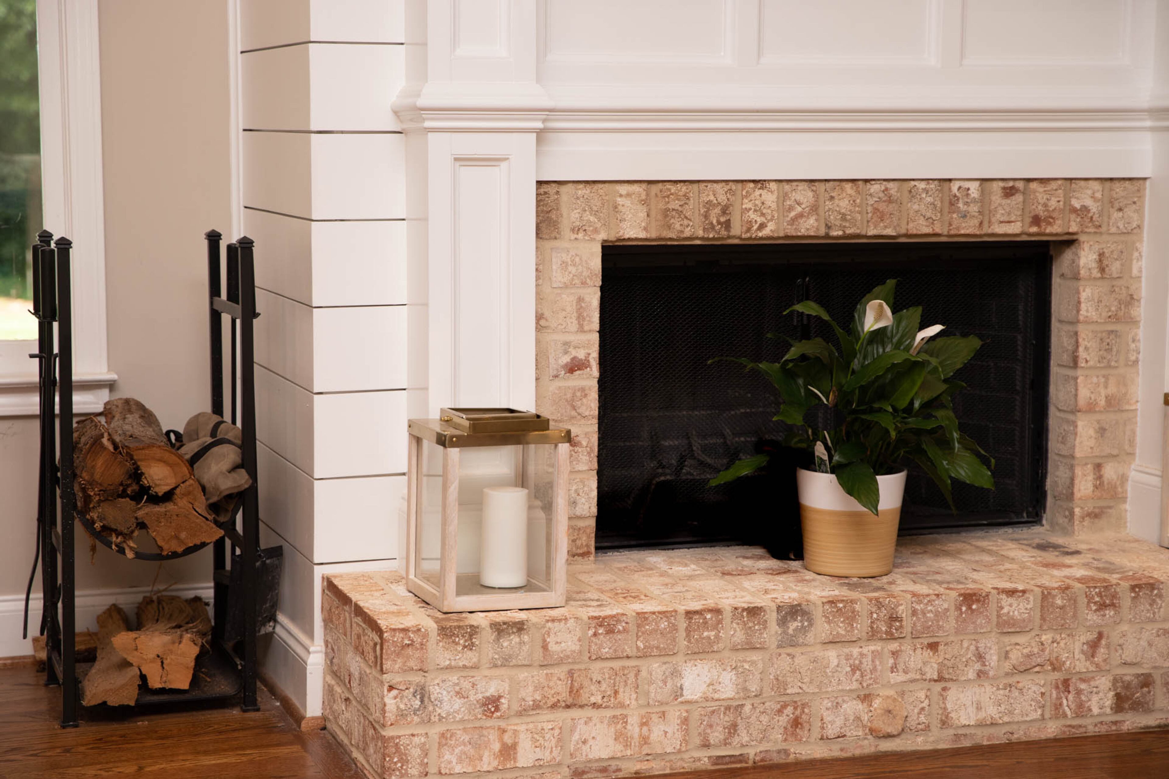 Homeowner Allie Ott chose to do her fireplace in shiplap after seeing similar styles on Pinterest and falling in love with the look. The living room was part of the 2017 addition, in which Allie and her husband Seth Ott worked with builder Jessica Murphy with Her Cave Atlanta and architect Ebru Ercan of e3 design.