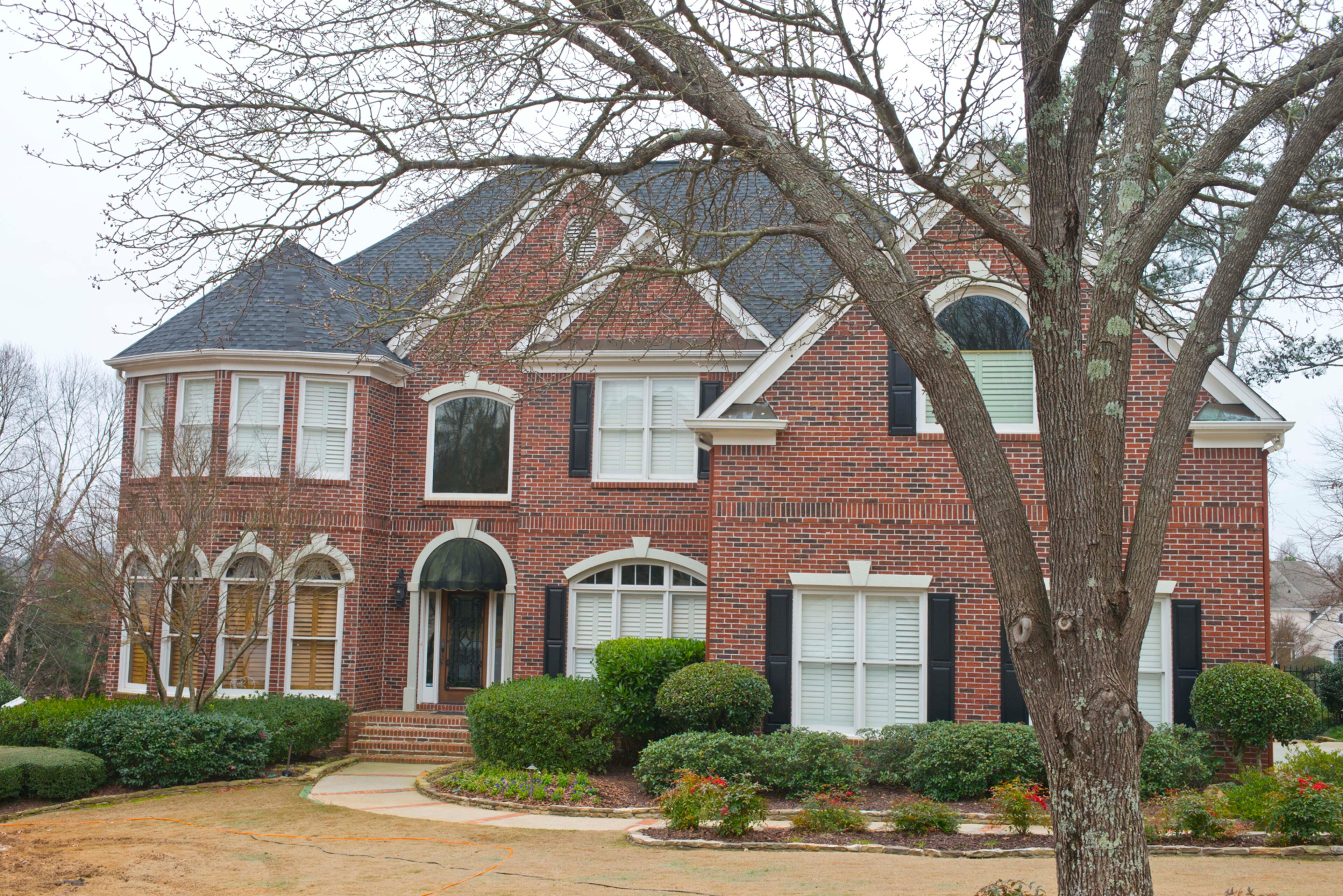 Zack Bernato admits the Southern style of the brick Alpharetta home wasn’t appealing to him, but he and his family desired to move to a larger community in north Fulton County. "We just gradually started adding to different parts of the house," he says. -- Text by Lori Johnston, for the AJC