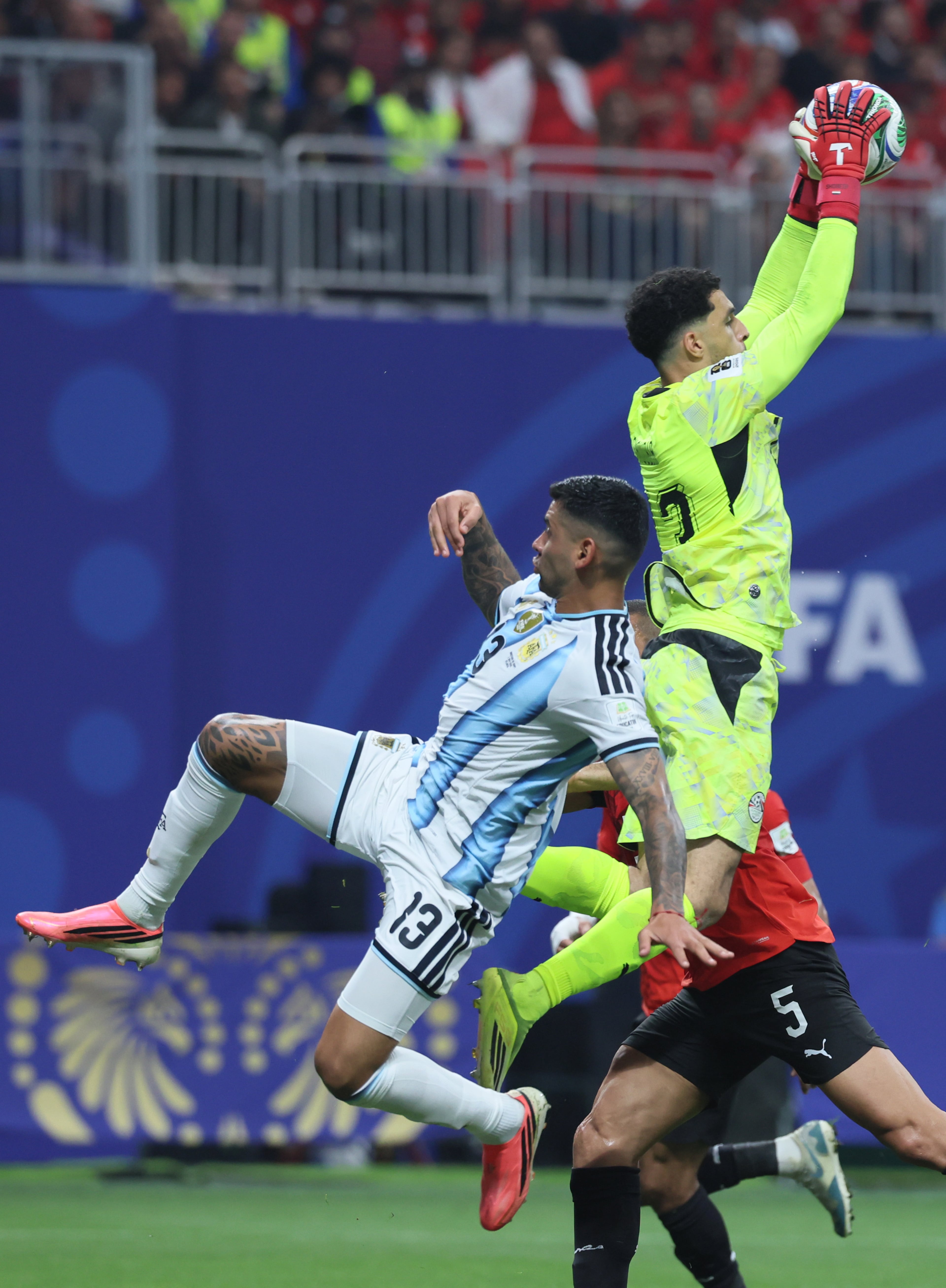 Egypt goalkeeper Mostafa Shoubir makes a save against Argentina's Cristian Romero during first half of Argentina vs. Egypt FIFA World Cup match at Atlanta Stadium (Mercedes-Benz Stadium) on Tuesday, July 7, 2026. (Jason Getz/AJC)
