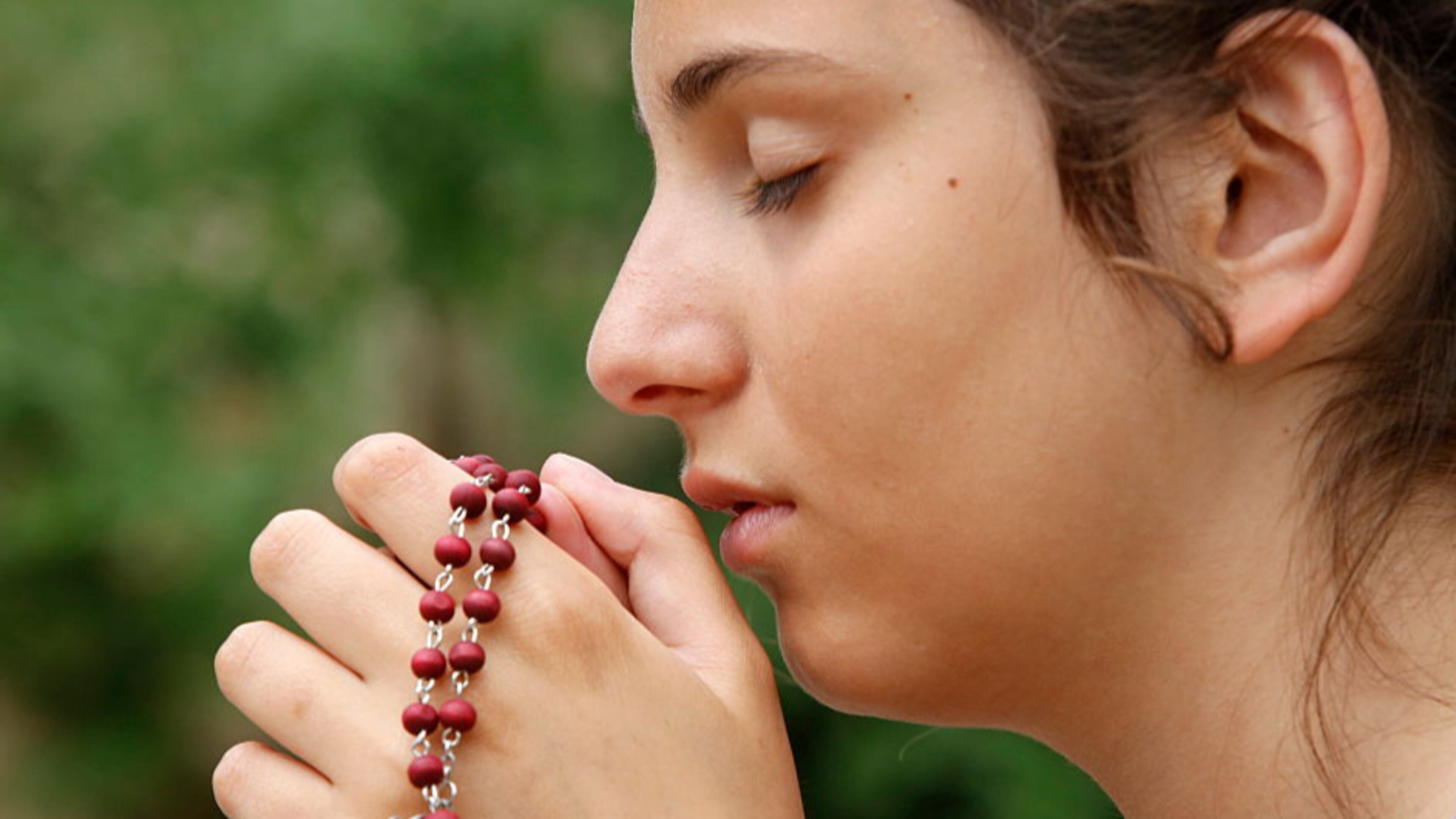Girl prays.
