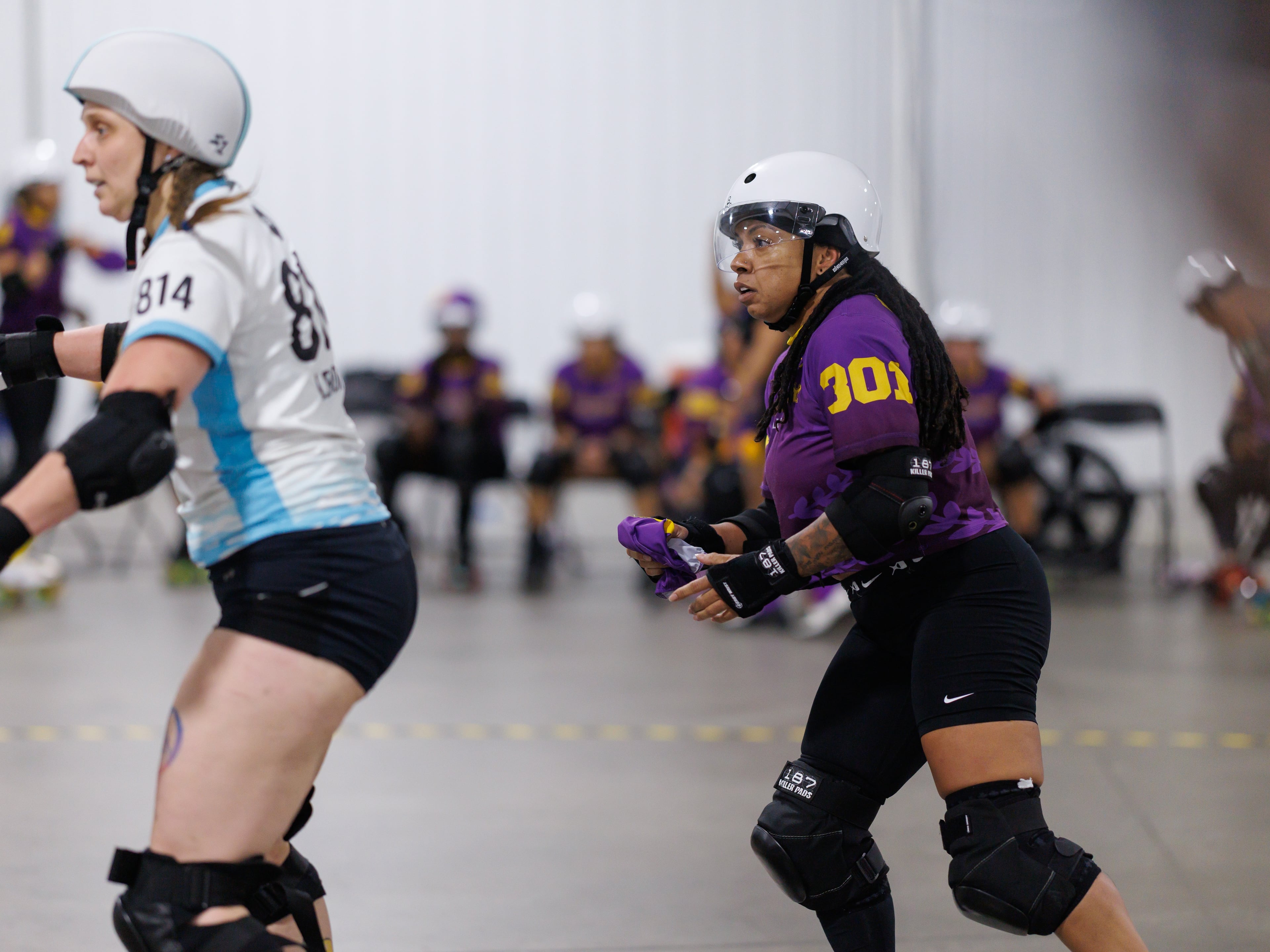 Donita Green (right), also known as Blaxyl Rose, skates during the playoffs in Columbia, South Carolina. (Courtesy of Ethan Trewhitt)