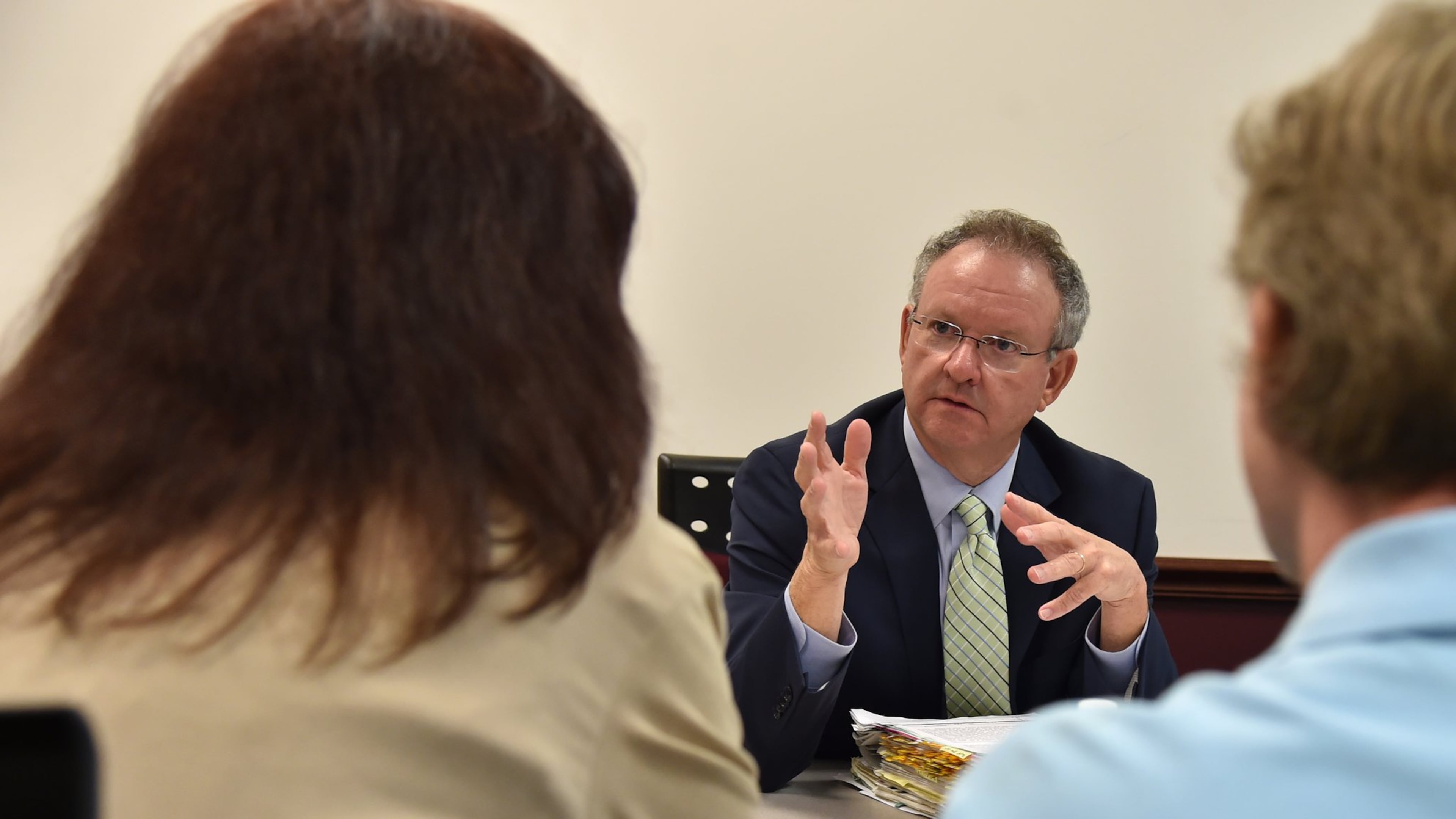 Amy Best listens to Terry Barnard, chairman of the State Board of Pardons and Paroles, during Victims Visitor’s Day on Tuesday, April 19, 2016. Best’s sister, Abby Vandiver, was killed in 1987 by 15-year-old Richard E. Gellner. Victims of crime were able to meet face-to-face with members of the Parole Board to discuss the status of the case against the people in prison for harming them or their family. Gellner is currently up for parole. (BRANT SANDERLIN/BSANDERLIN@AJC.COM)