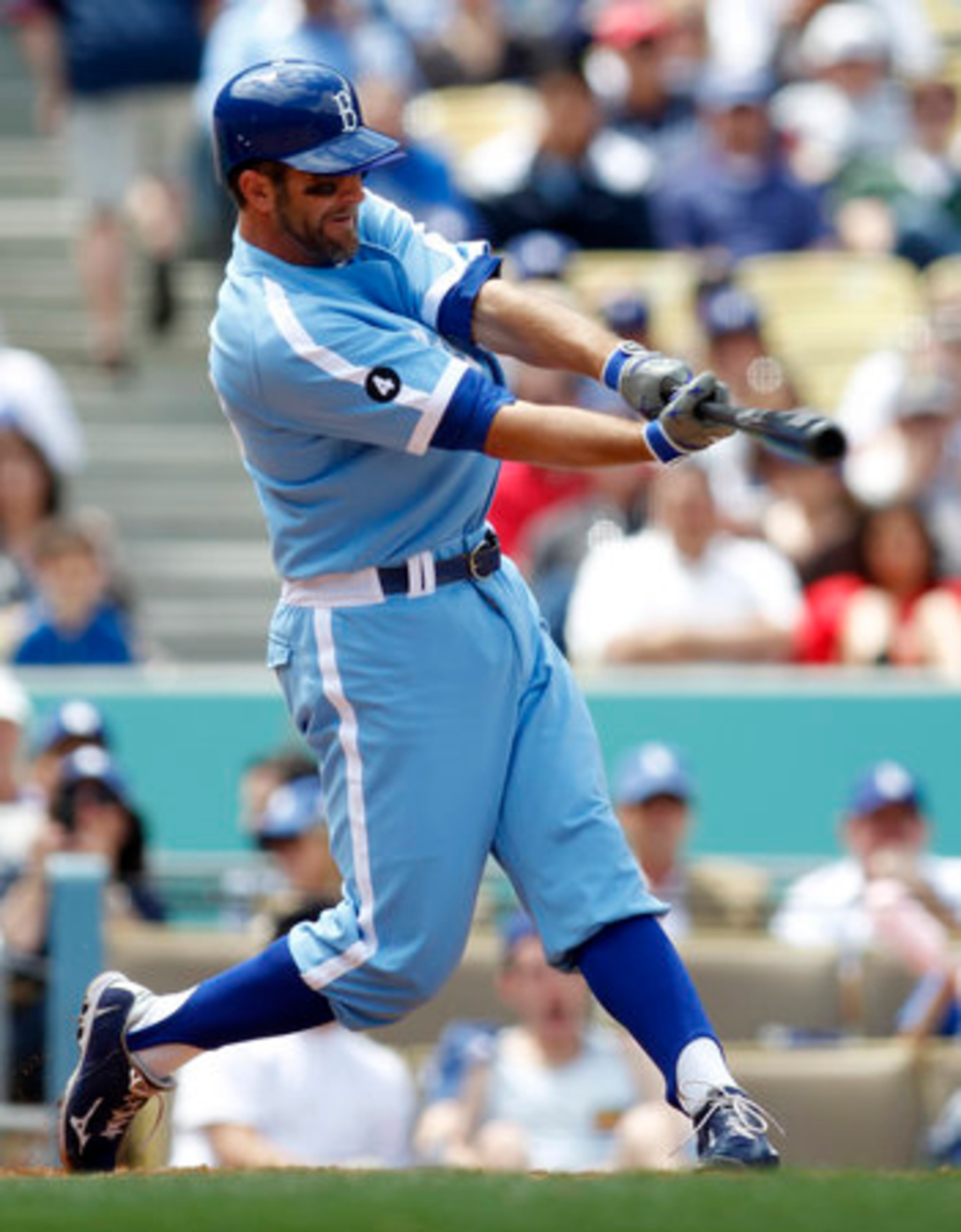 Dodgers' Casey Blake hits a solo home run against the Atlanta Braves during the seventh inning of a baseball game, Thursday, April 21, 2011, in Los Angeles.