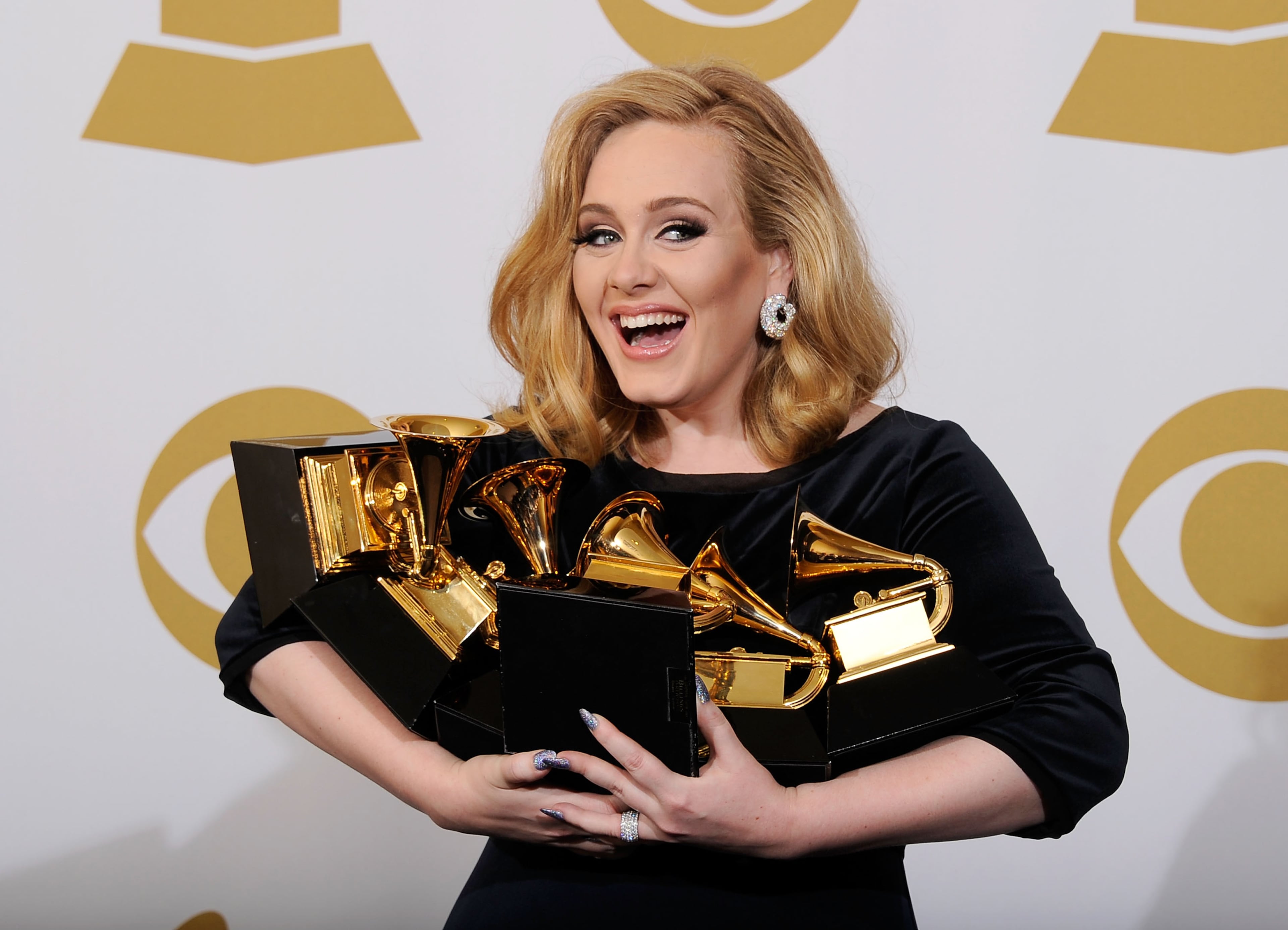 Singer Adele, winner of six GRAMMYs, poses in the press room at the 54th Annual GRAMMY Awards at Staples Center on February 12, 2012 in Los Angeles, California. (Photo by Kevork Djansezian/Getty Images)