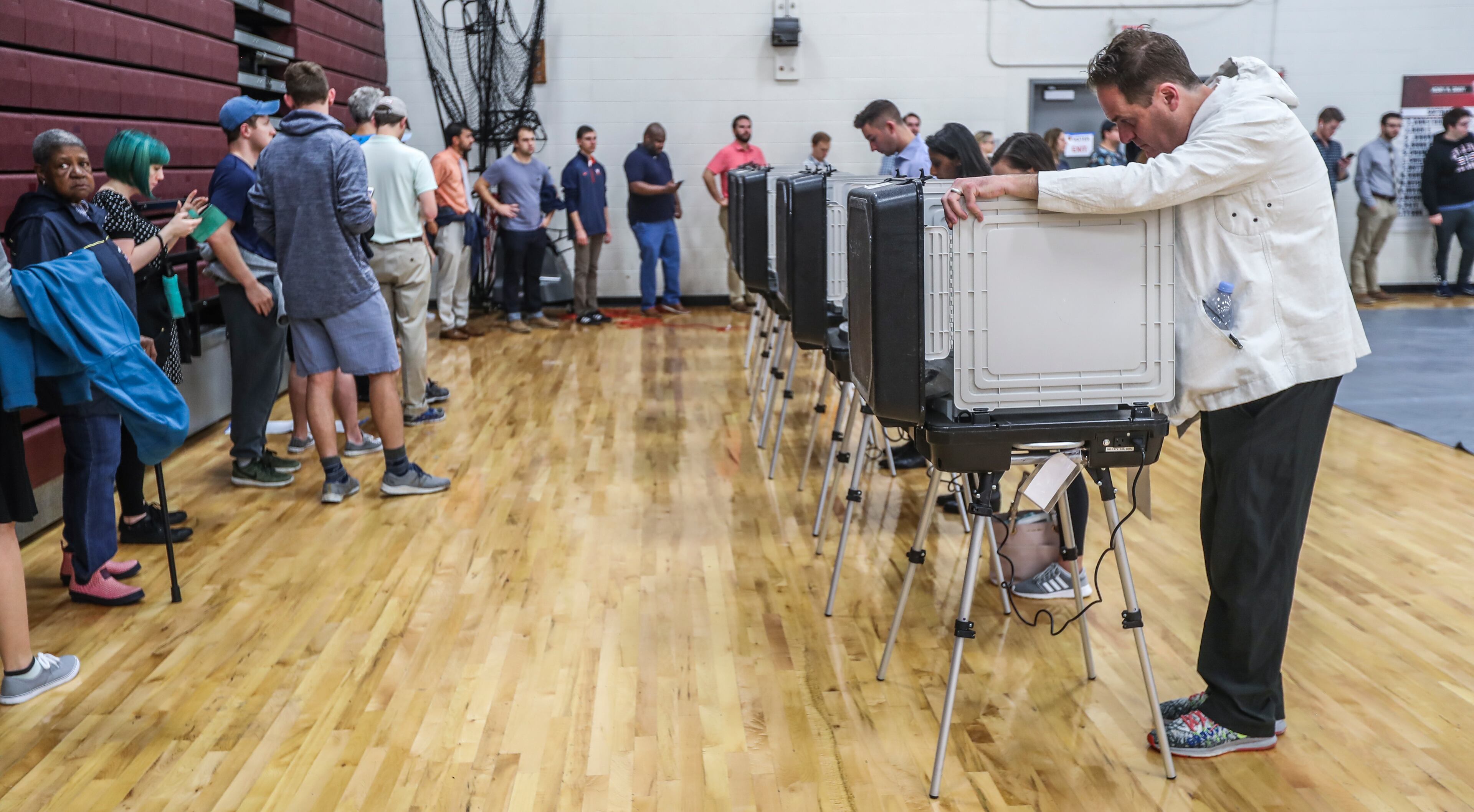 November 6, 2018 Atlanta : Voters waited over an hour to vote at Henry W. Grady High School at 29 Charles Allen Dr NE, in Atlanta on Tuesday Nov. 6, 2018. Metro Atlanta polling places reported steady lines as voters went to the polls Tuesday. Georgia voters were asked Nov. 6 whether the state constitution should be amended to give a 10-year, $200 million boost to land conservation, solidify the states commitment to crime victims and cut timberland taxes. Five proposed amendments appeared on the ballot, which most notably settles the long and hard-fought races for governor and other key offices. JOHN SPINK/JSPINK@AJC.COM