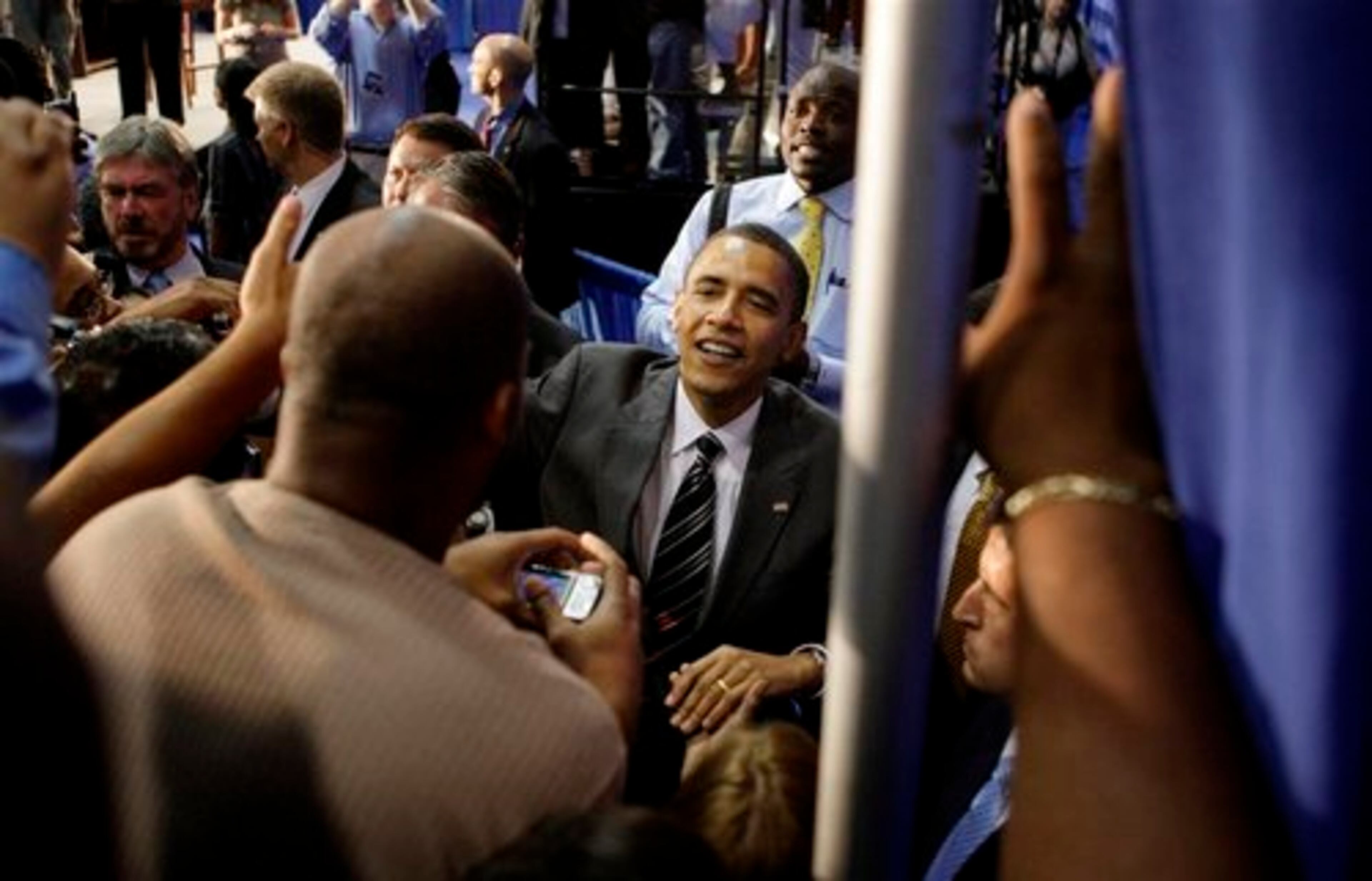 Democratic presidential candidate, Sen. Barack Obama, center, greets supporters.
