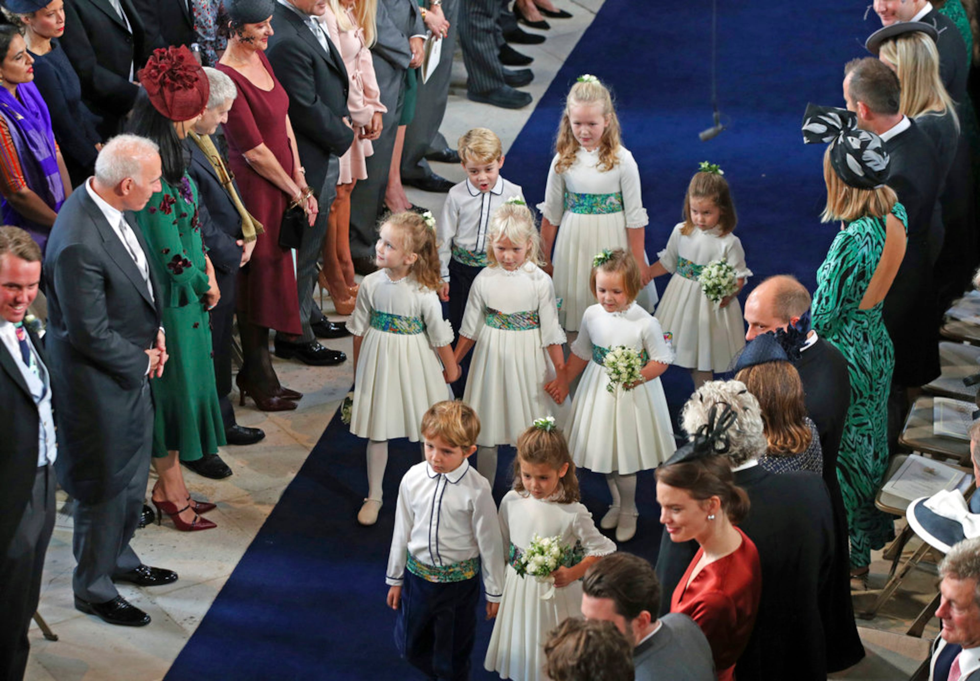 The bridesmaids and page boys arrive for the wedding of Princess Eugenie of York and Jack Brooksbank in St Georgeâs Chapel, Windsor Castle, near London, England, Friday Oct. 12, 2018. (Yui Mok, Pool via AP)