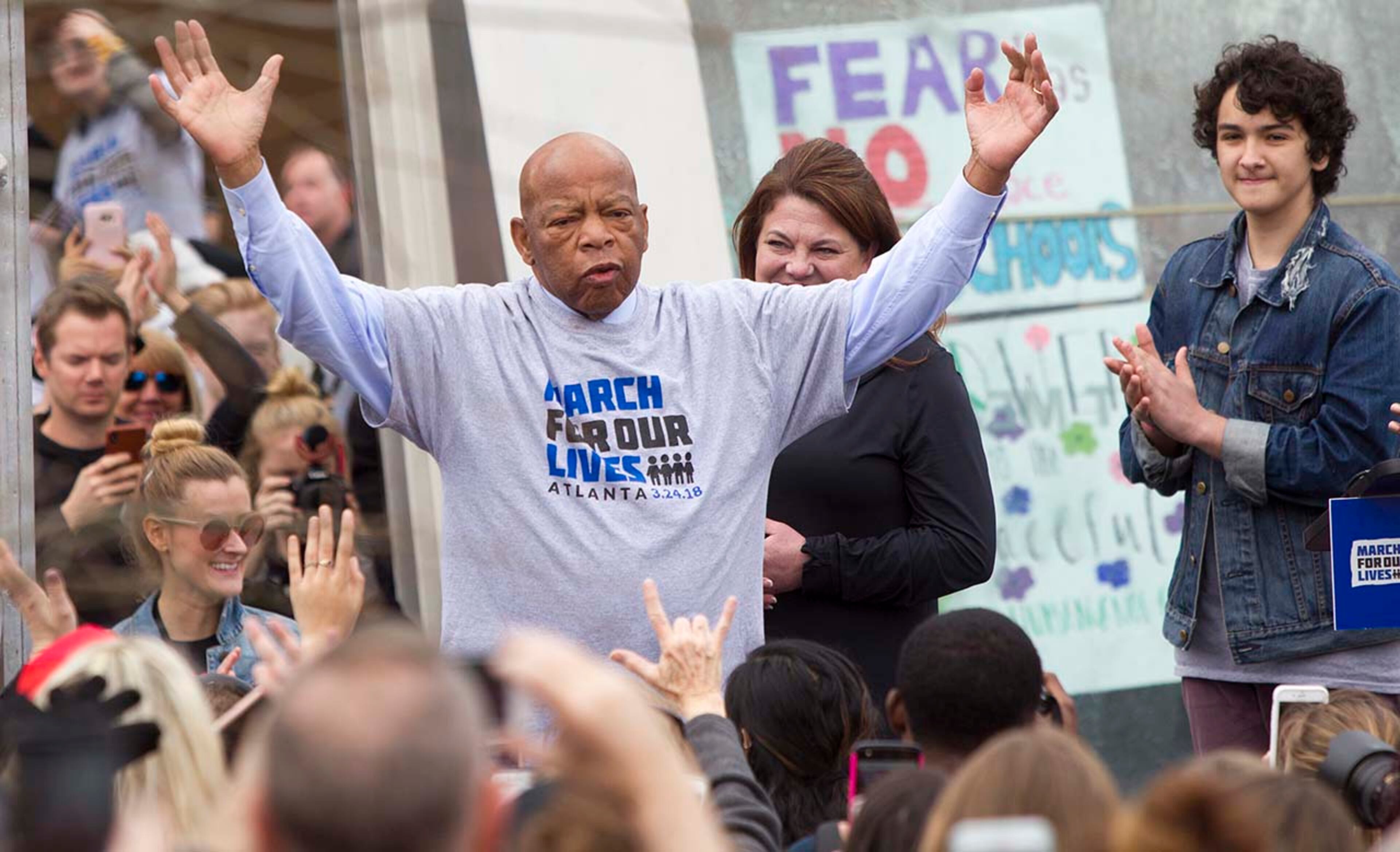 Congressman John Lewis waves to the crowd during the March for our Lives event in Atlanta, Georgia, on Saturday, March 24, 2018. (REANN HUBER/REANN.HUBER@AJC.COM)