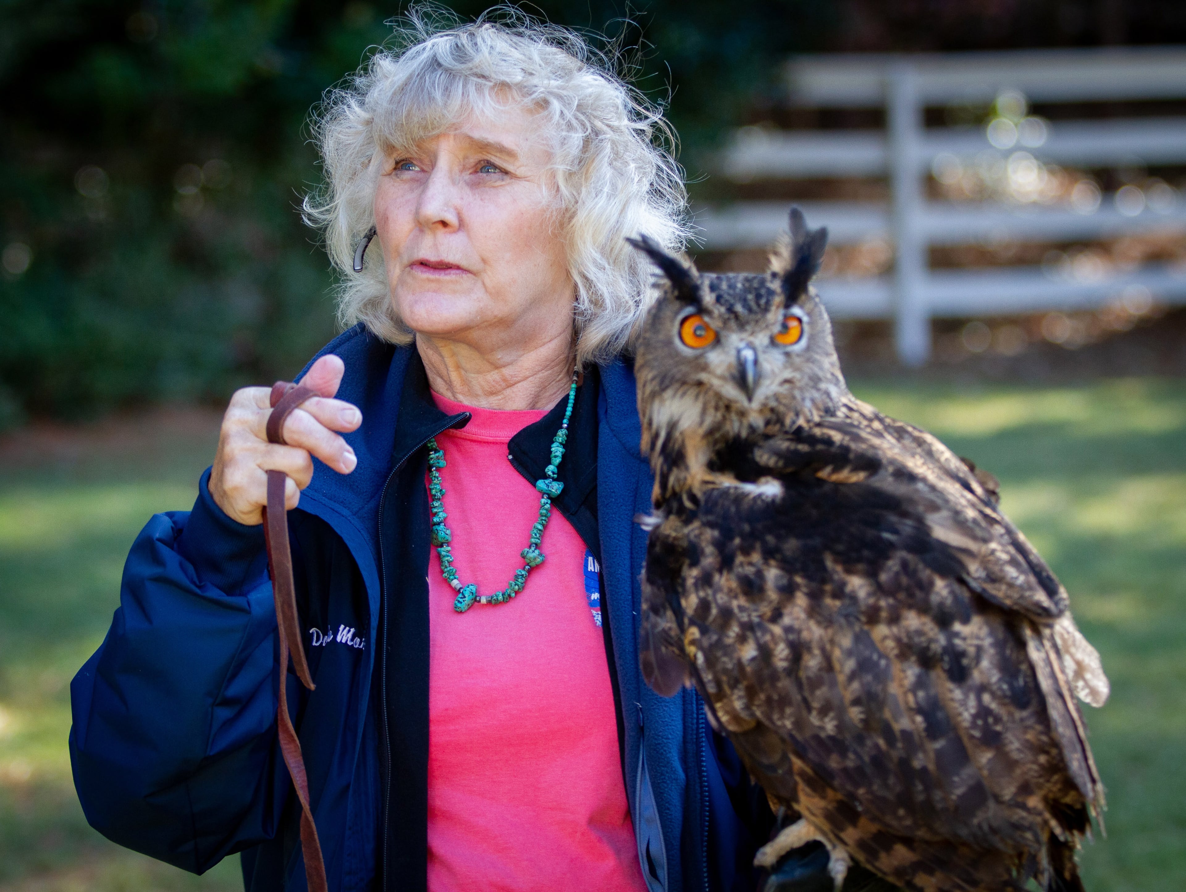 Leann Schurpel talks about the Eurasian Eagle Owl before the start of the Winged Ambassador demonstration during the 20th annual Native American Festival & Pow Wow at Stone Mountain Park Sunday, November 10, 2019. STEVE SCHAEFER / SPECIAL TO THE AJC