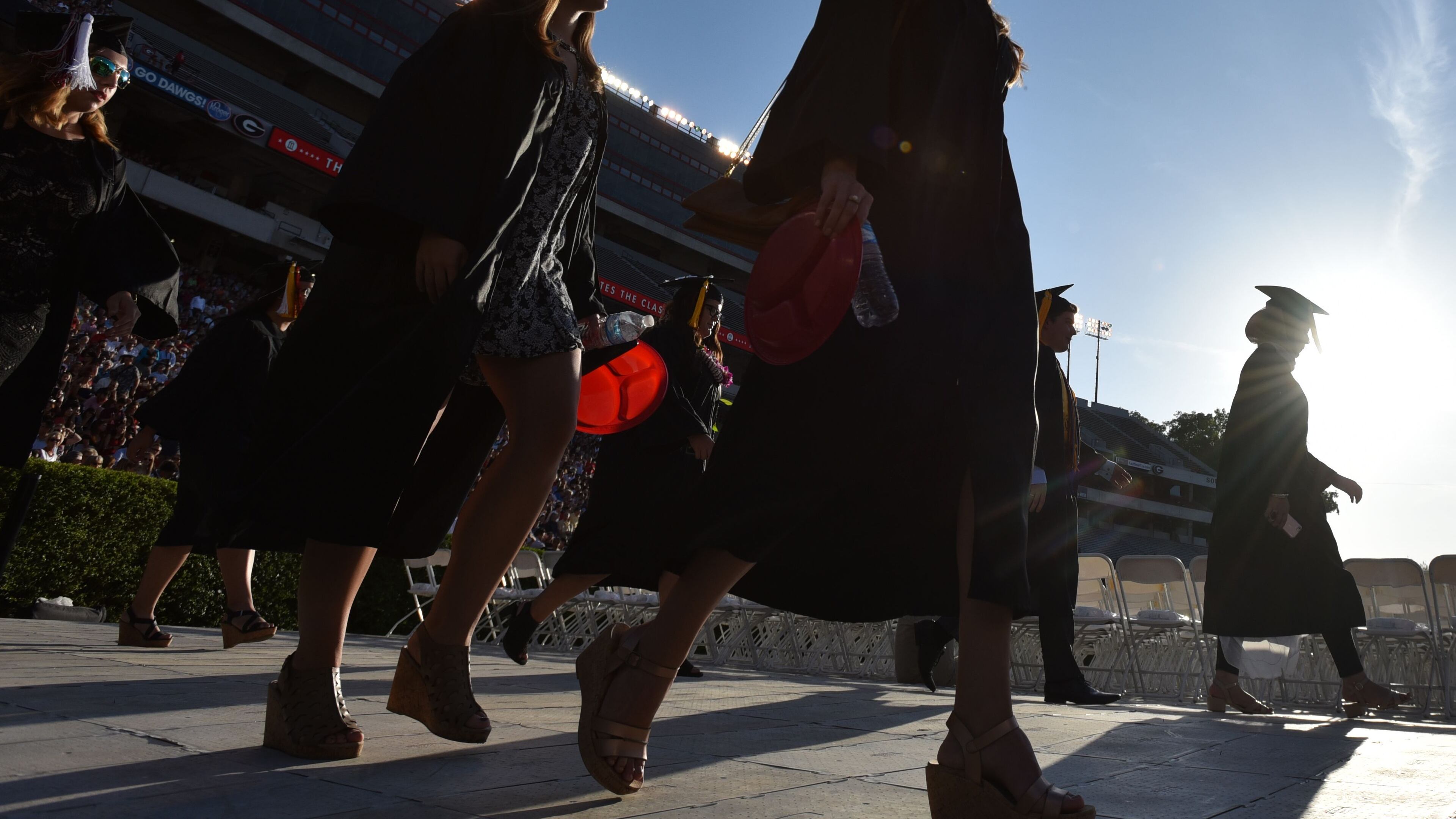 Students fill the University of Georgia’s Sanford Stadium for their 2016 graduation commencement. BRANT SANDERLIN/BSANDERLIN@AJC.COM