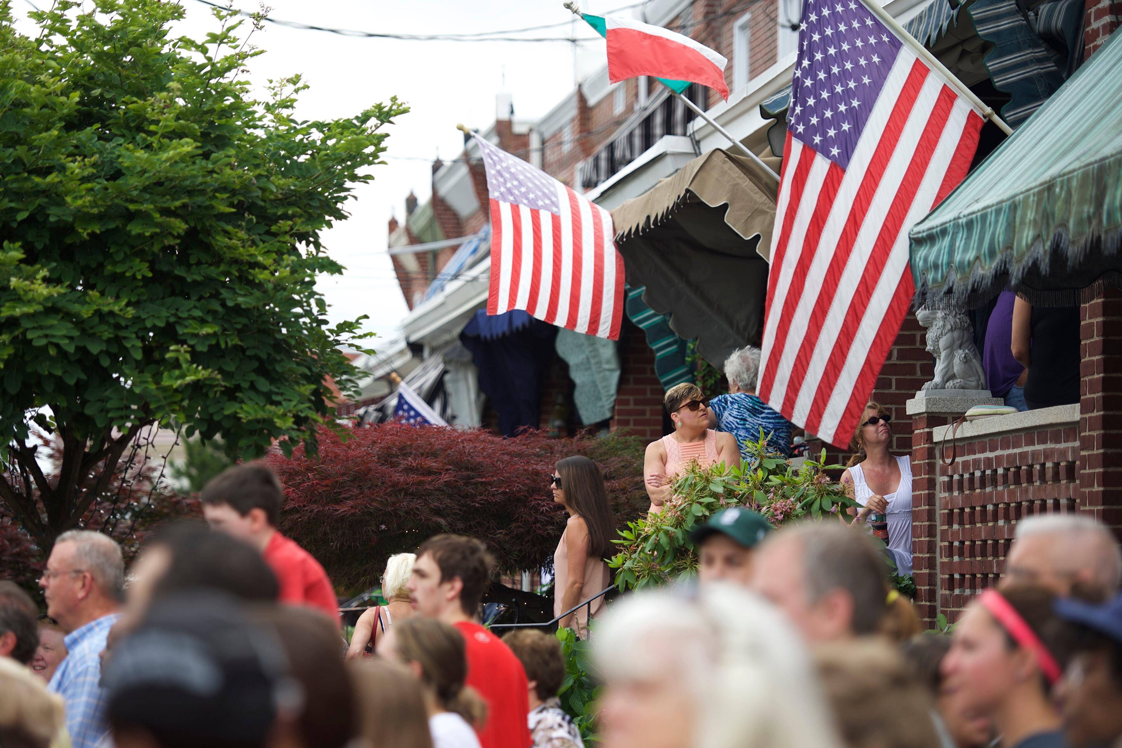 WILMINGTON, DE - JUNE 6: Onlookers gather across the street before the hearse and Biden family arrive for a mass of Christian burial at St. Anthony of Padua Church for former Delaware Attorney General Beau Biden, on June 6, 2015 in Wilmington, Delaware. U.S. President Barack Obama is expected to deliver a eulogy for the son of Vice President Joe Biden after he died at 46 following a two-year battle with brain cancer. (Photo by Mark Makela/Getty Images)