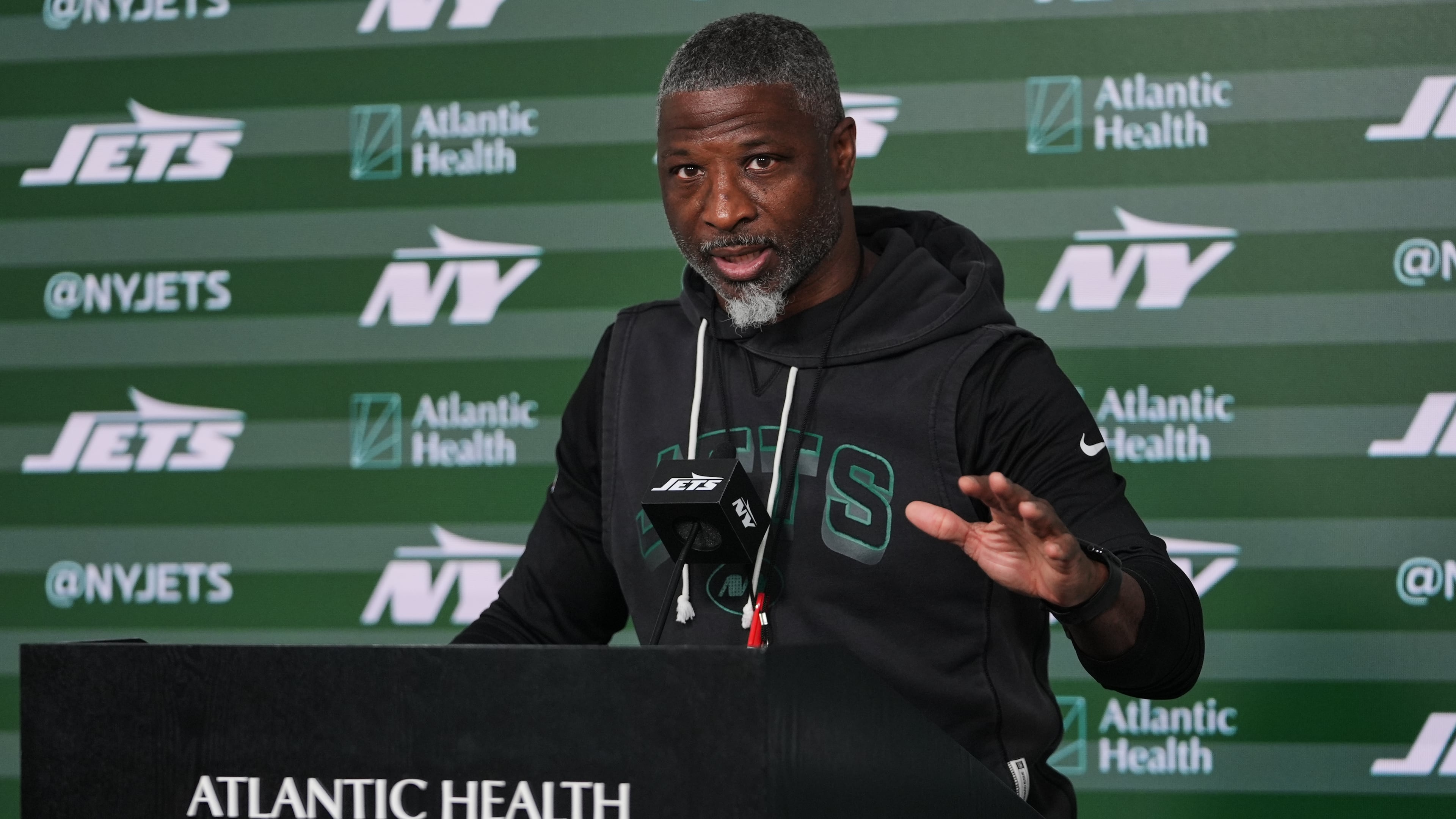 FILE - New York Jets head coach Aaron Glenn speaks at a news conference during rookie minicamp at the NFL football team's practice facilit, May 8, 2026, in Florham Park, N.J. (AP Photo/Frank Franklin II, File)
