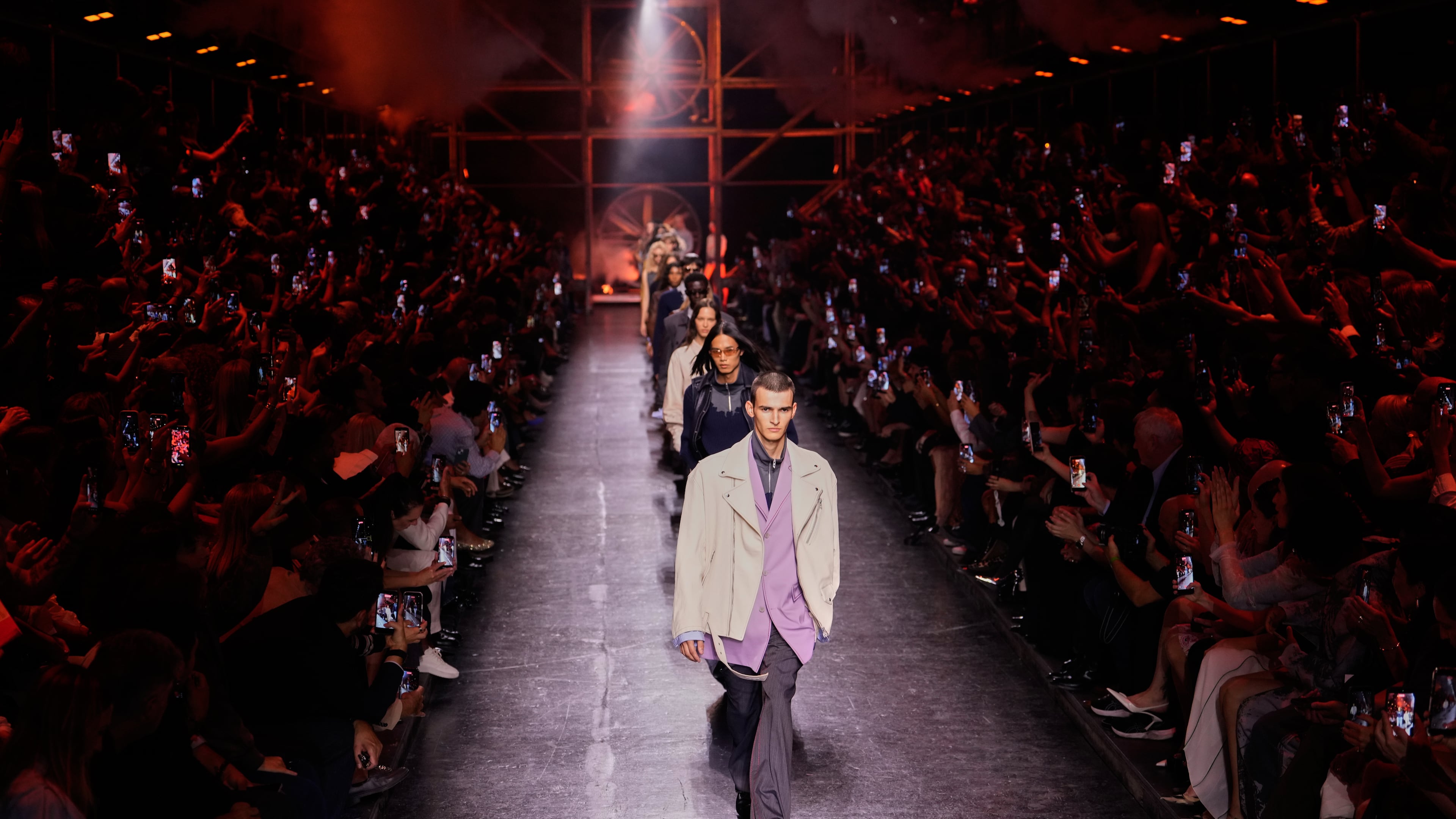 Models wear creations from Diesel's Spring-Summer 2027 collection presented in Milan, Italy, Tuesday, Sept. 22, 2026. (AP Photo/Luca Bruno)