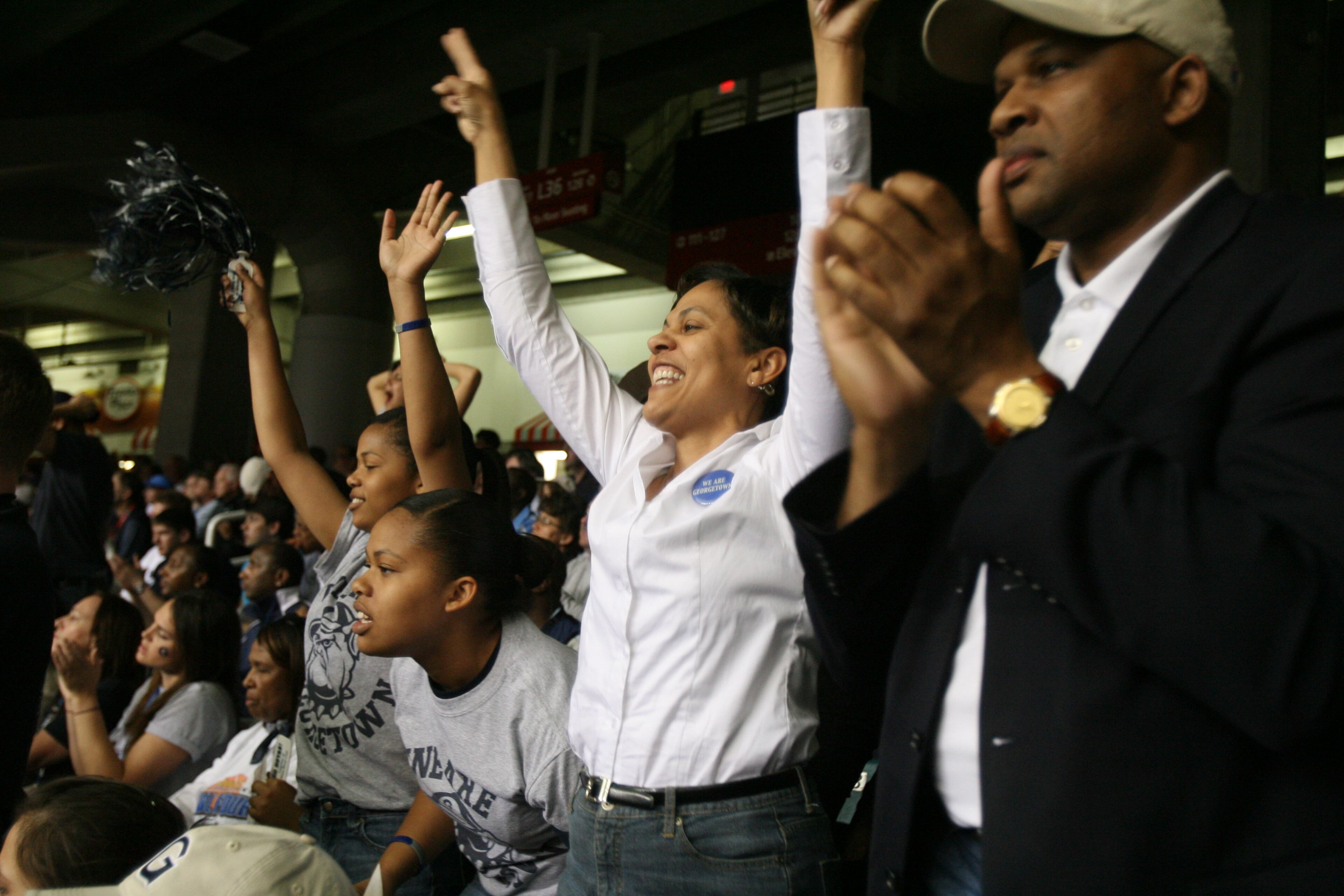 Georgetown family (r-l) father Manuel Wallace, mother Cynthia Wallace, sister Ciara Wallace and sister Hanna Wallace cheer their team in the first half or the semi-final game between Ohio State and Georgetown Saturday March 31, 2007 at the Georgia Dome.
