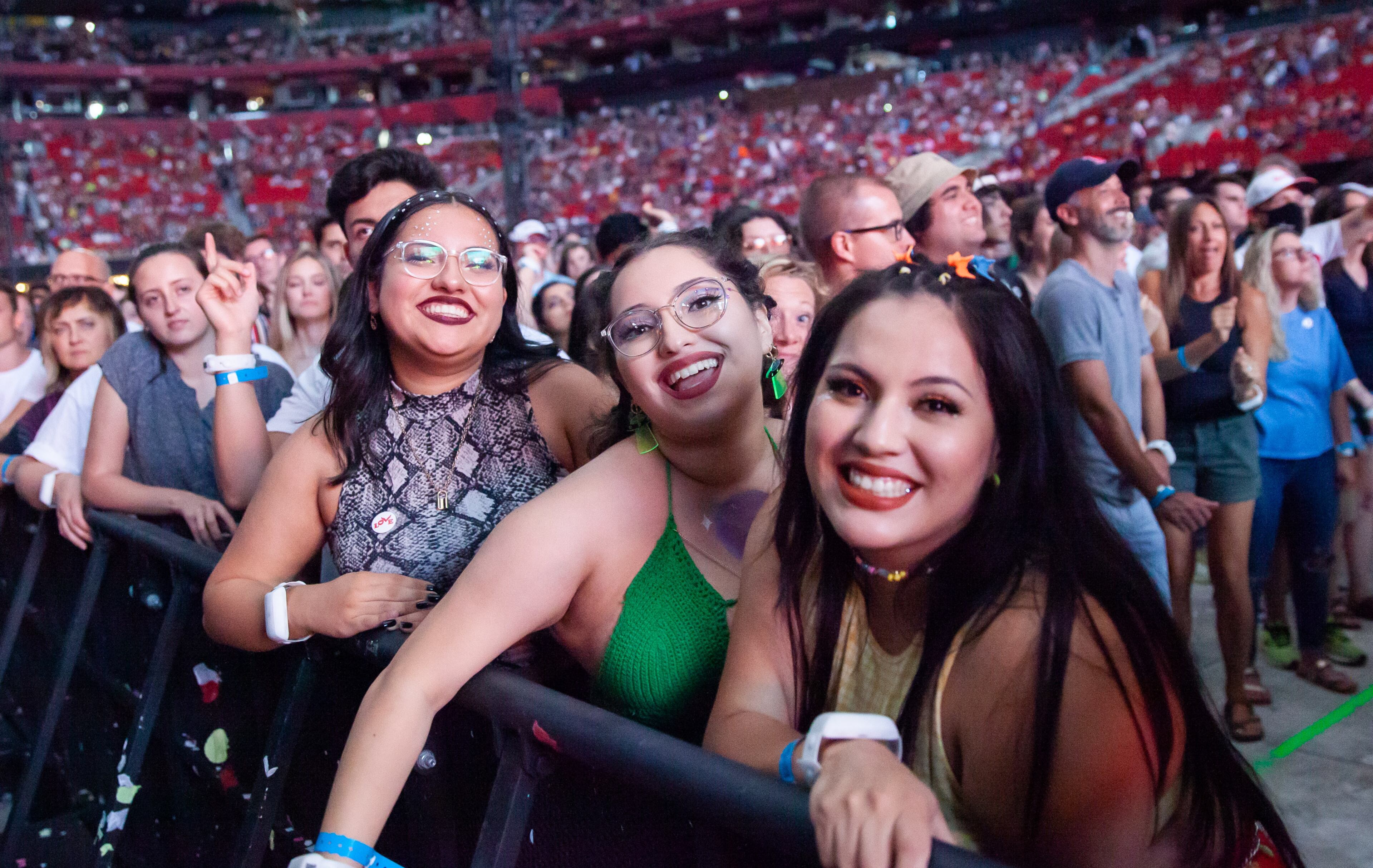 Fans get geared up for an entertaining night as Coldplay brought its Music of the Spheres World Tour to Mercedes-Benz Stadium in Atlanta on Saturday, June 11, 2022. (Ryan Fleisher for The Atlanta Journal-Constitution)