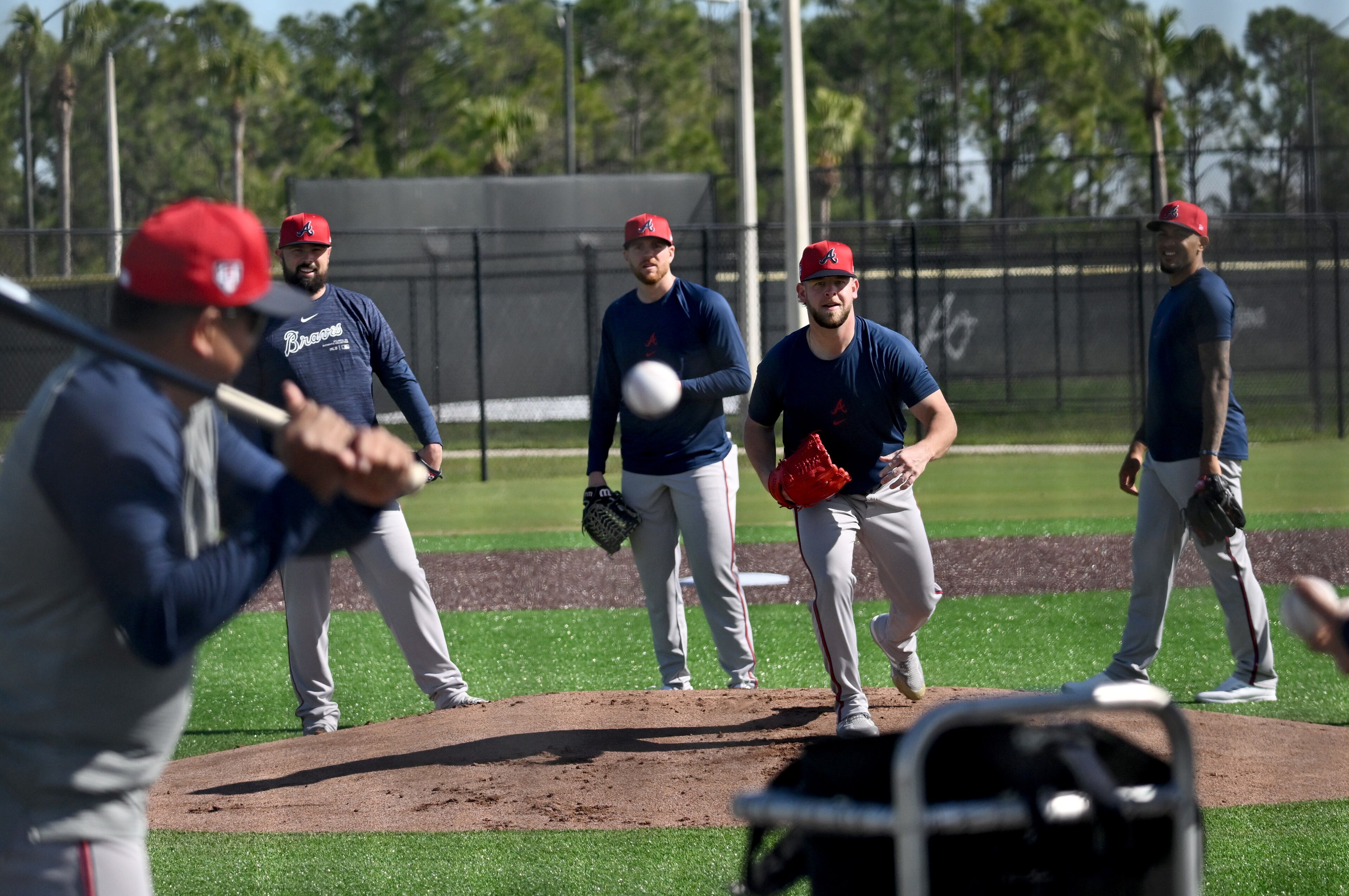 Braves relief pitcher A.J. Minter gets ready to field a ground ball during spring training at CoolToday Park in North Port, Florida on Wednesday, Feb., 14, 2024. (Hyosub Shin / Hyosub.Shin@ajc.com)