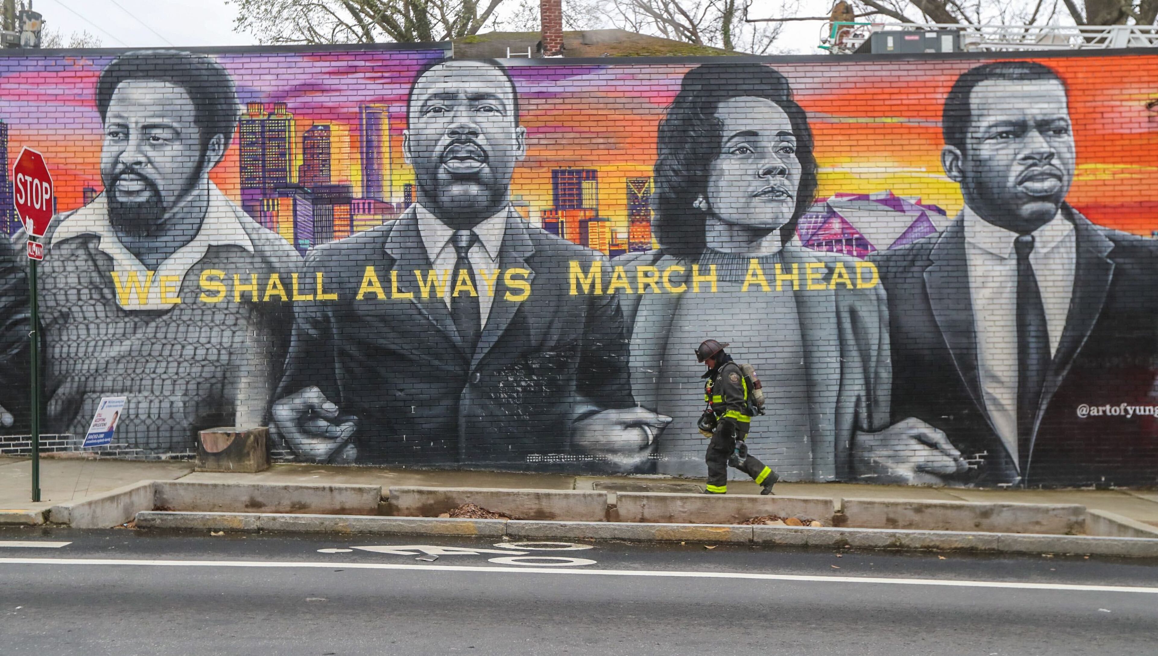 Firefighters respond to a two-story home broken into apartments in northwest Atlanta. No one was injured in the fire, but at least three residents were displaced.