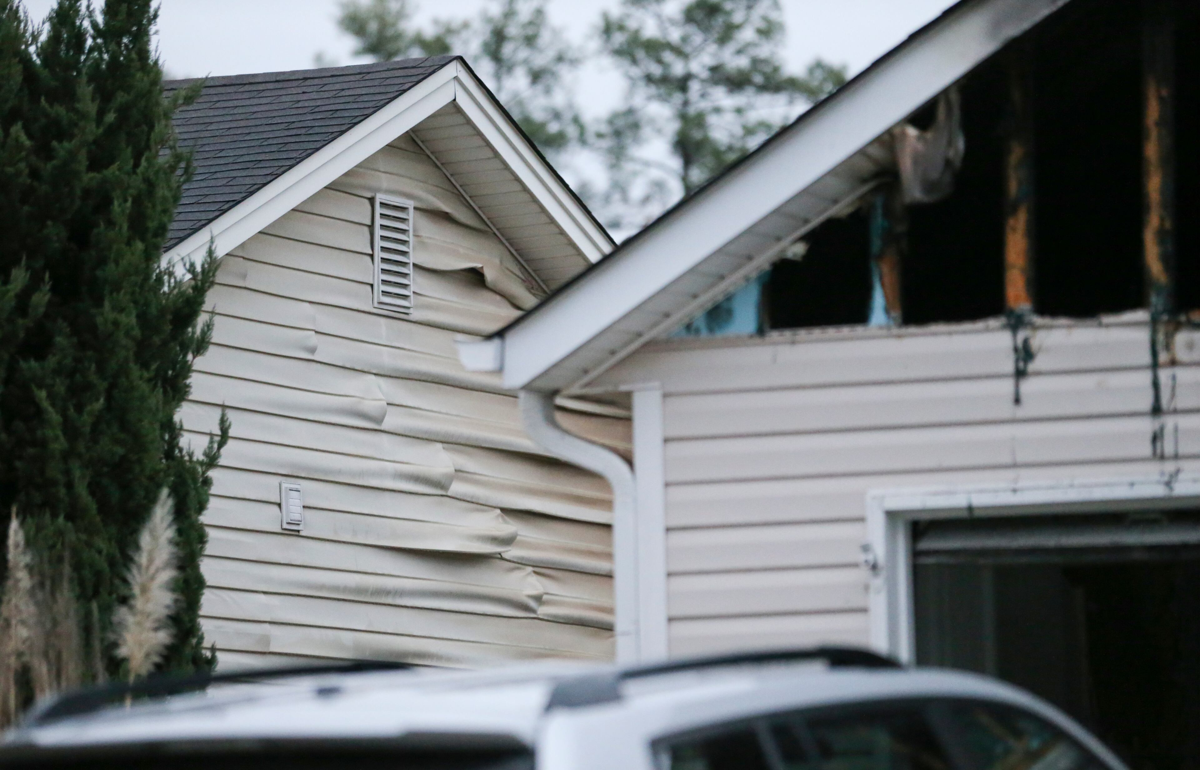 Thirteen people were displaced in a predawn fire that damaged four homes in a neighborhood near Lawrenceville. The fire broke out before 4 a.m. Wednesday, Feb. 26, 2014 in a home on Morning Glory Lane and spread to adjacent houses, according to Gwinnett County fire Lt. Colin Rhoden.