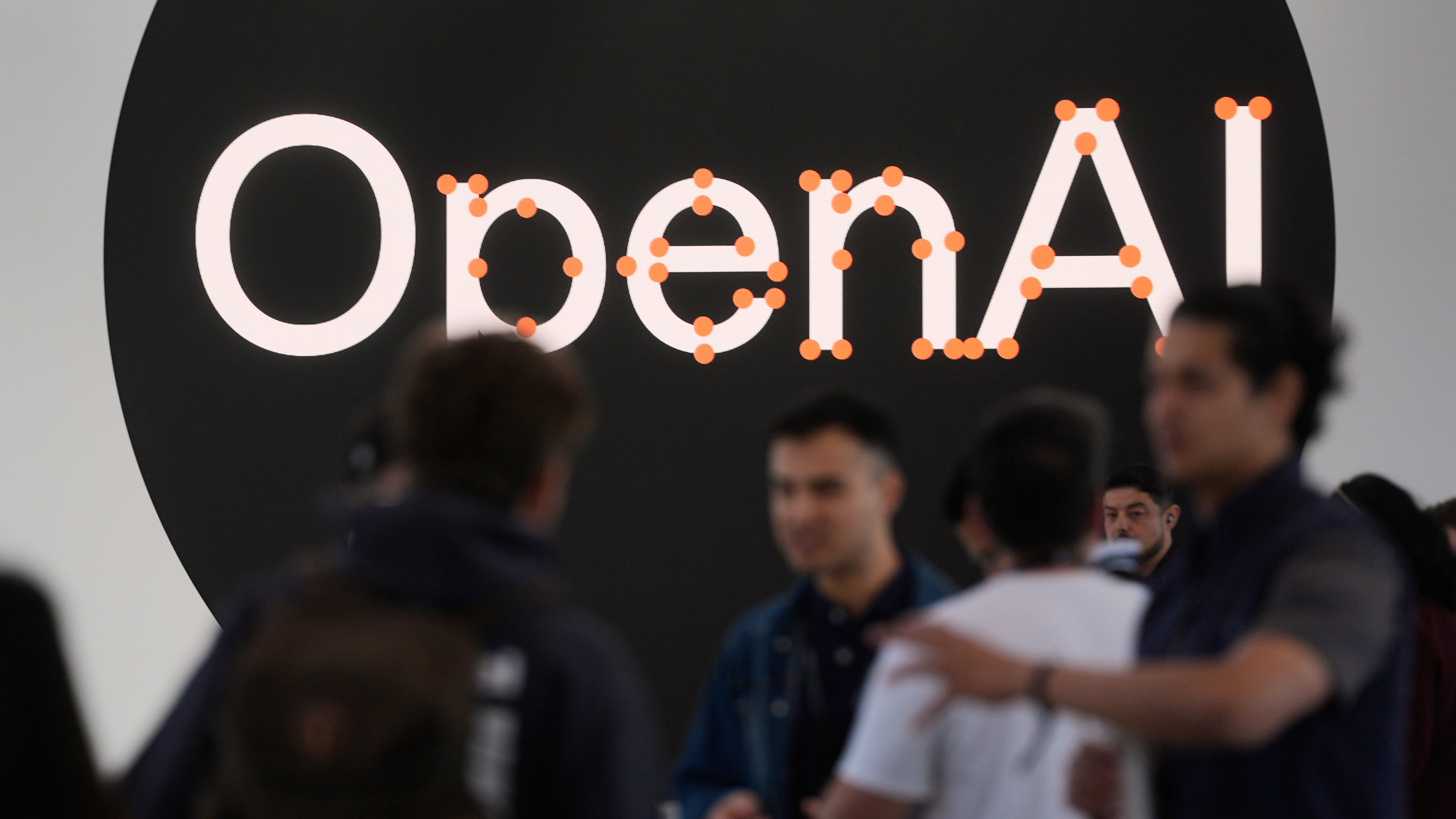 Attendees gather at the OpenAI DevDay 2026 conference, Tuesday, Sept. 29, 2026, in San Francisco. (AP Photo/Jeff Chiu)