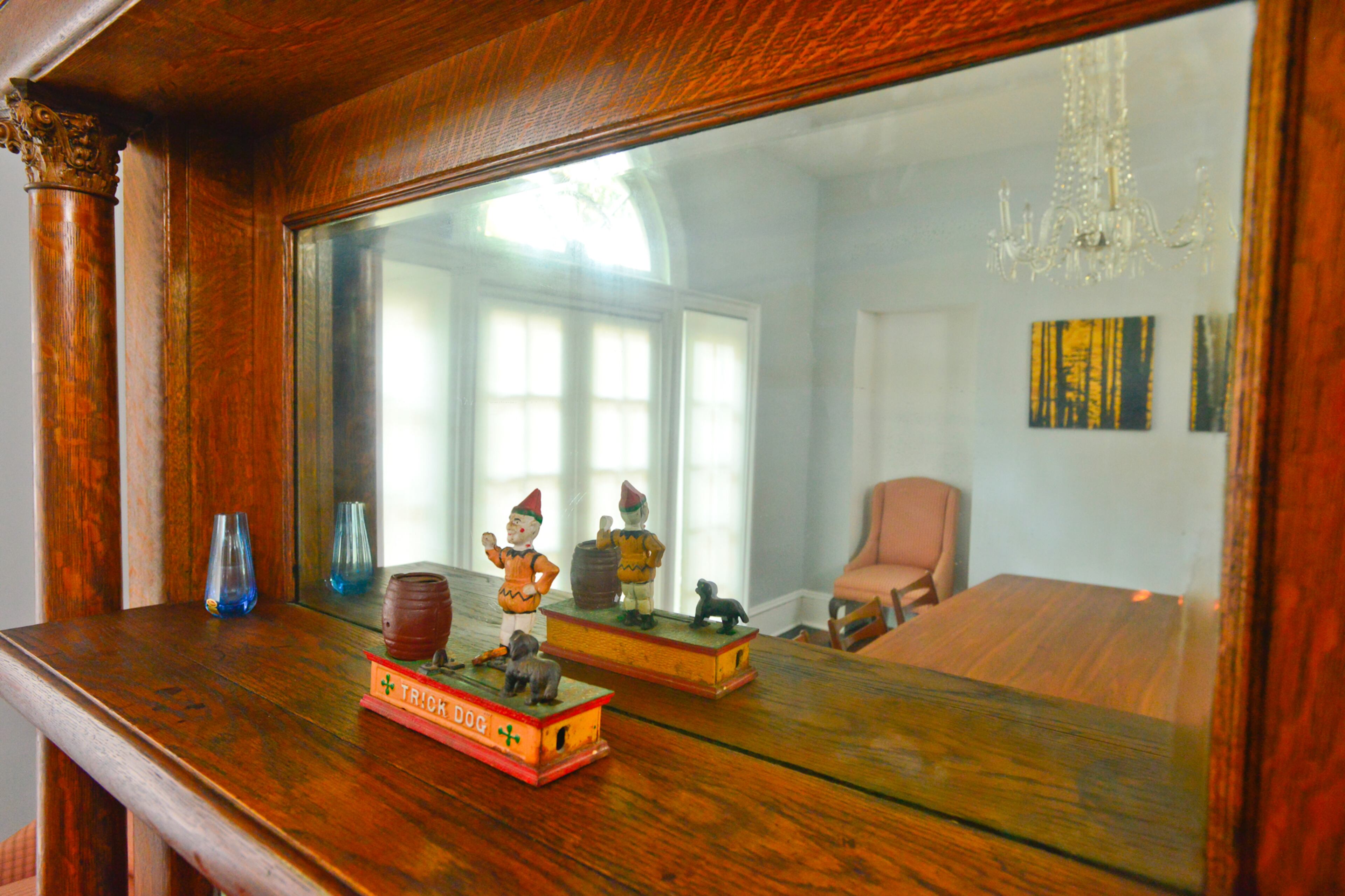 On the mantel, a cast-iron bank from the turn of the century was purchased by Karen Goeckel's uncle, an avid antiques hunter, while in Asheville, N.C. The homeowners say they have picked up his habit of bringing back pieces from travels within and outside the U.S.